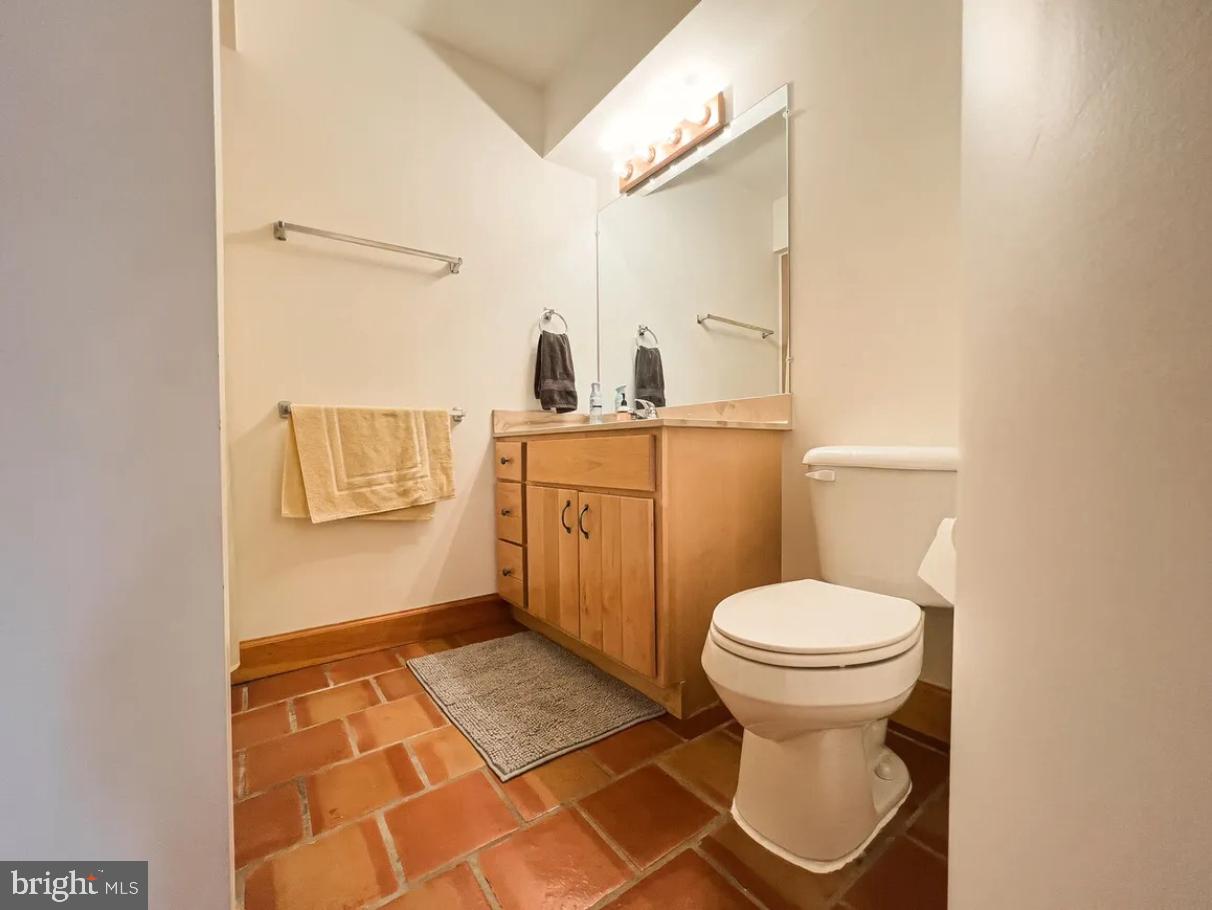 349 Lucas Road Warfordsburg, PA 17267 - Photo 35 of 59 a bathroom with a sink toilet and mirror