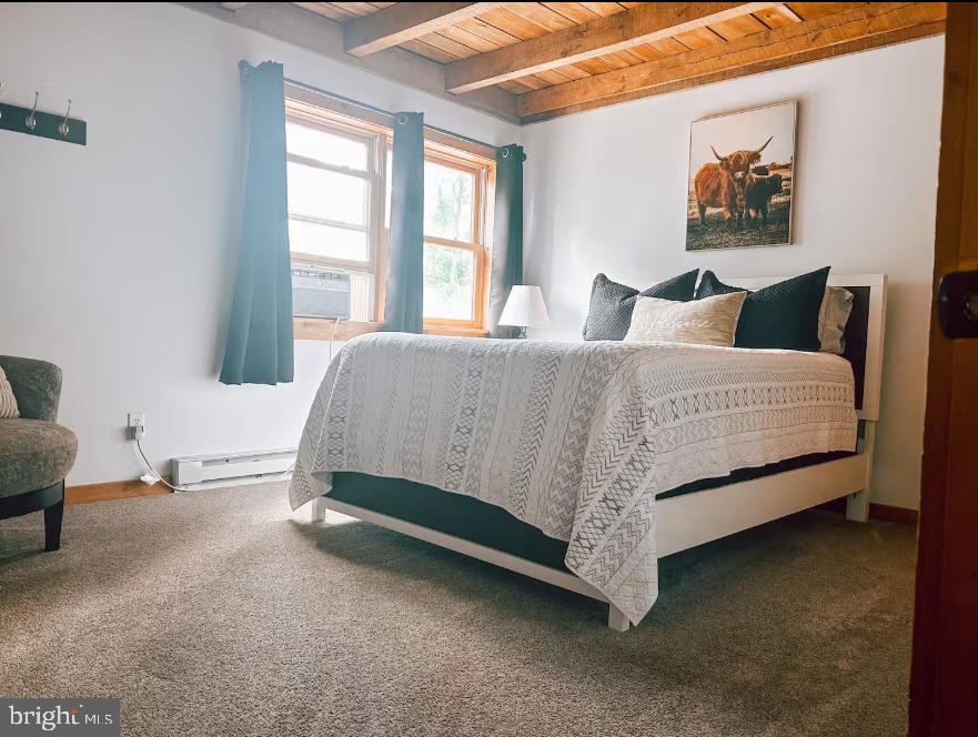 349 Lucas Road Warfordsburg, PA 17267 - Photo 53 of 59 a spacious bedroom with a bed and glass window