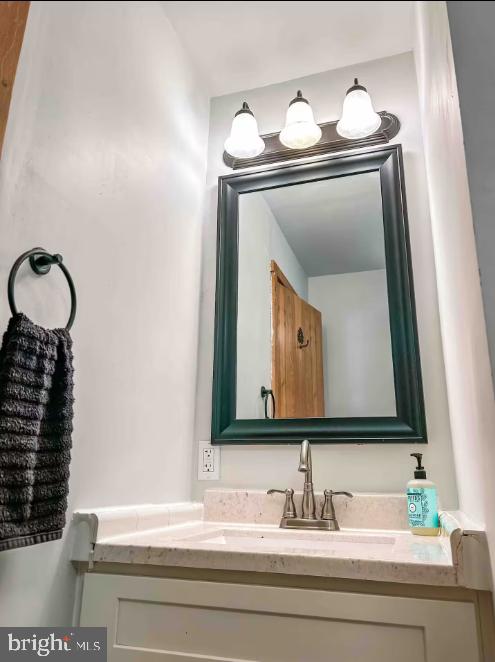 349 Lucas Road Warfordsburg, PA 17267 - Photo 56 of 59 a bathroom with a sink and a mirror