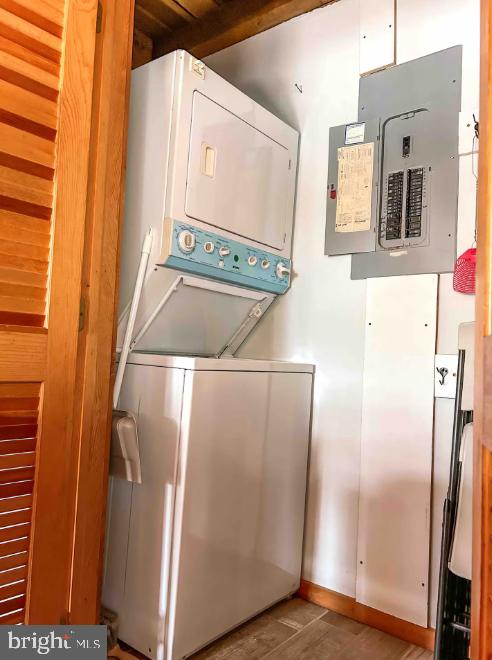 349 Lucas Road Warfordsburg, PA 17267 - Photo 58 of 59 a view of a refrigerator in kitchen and an empty room with wooden floor