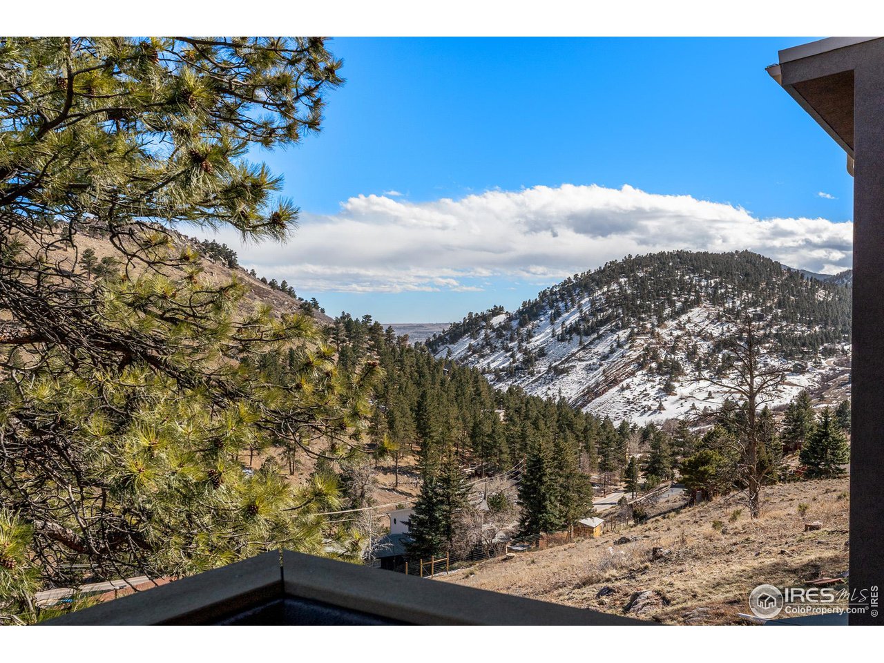 5339 Olde Stage Road Boulder, CO 80302 - Photo 15 of 40 View from Main level Guest Suite. One of the many mountain vista views on display throughout the home.