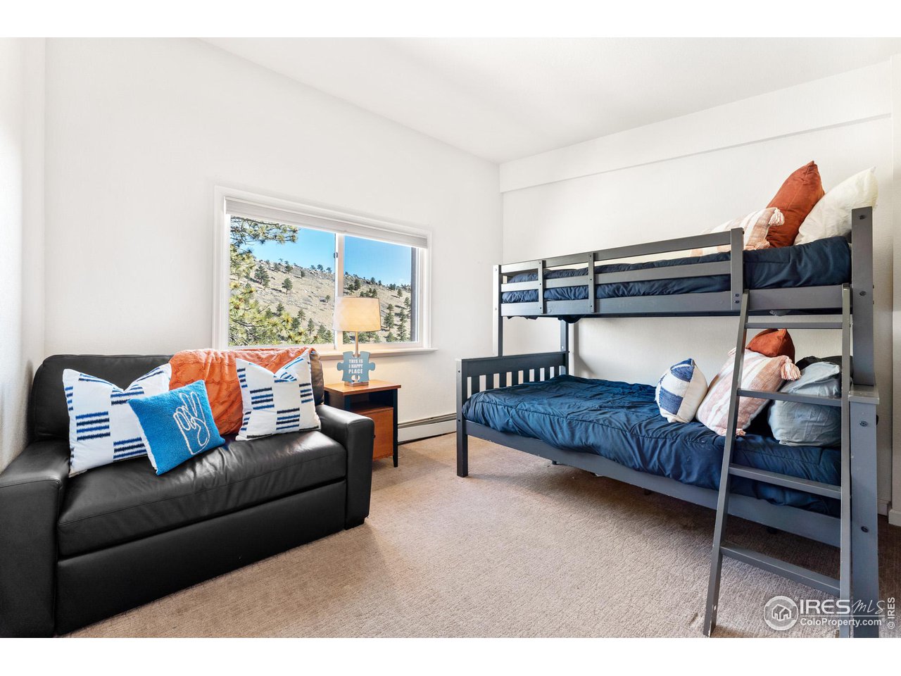 5339 Olde Stage Road Boulder, CO 80302 - Photo 30 of 40 Main level den, staged as Children's room.