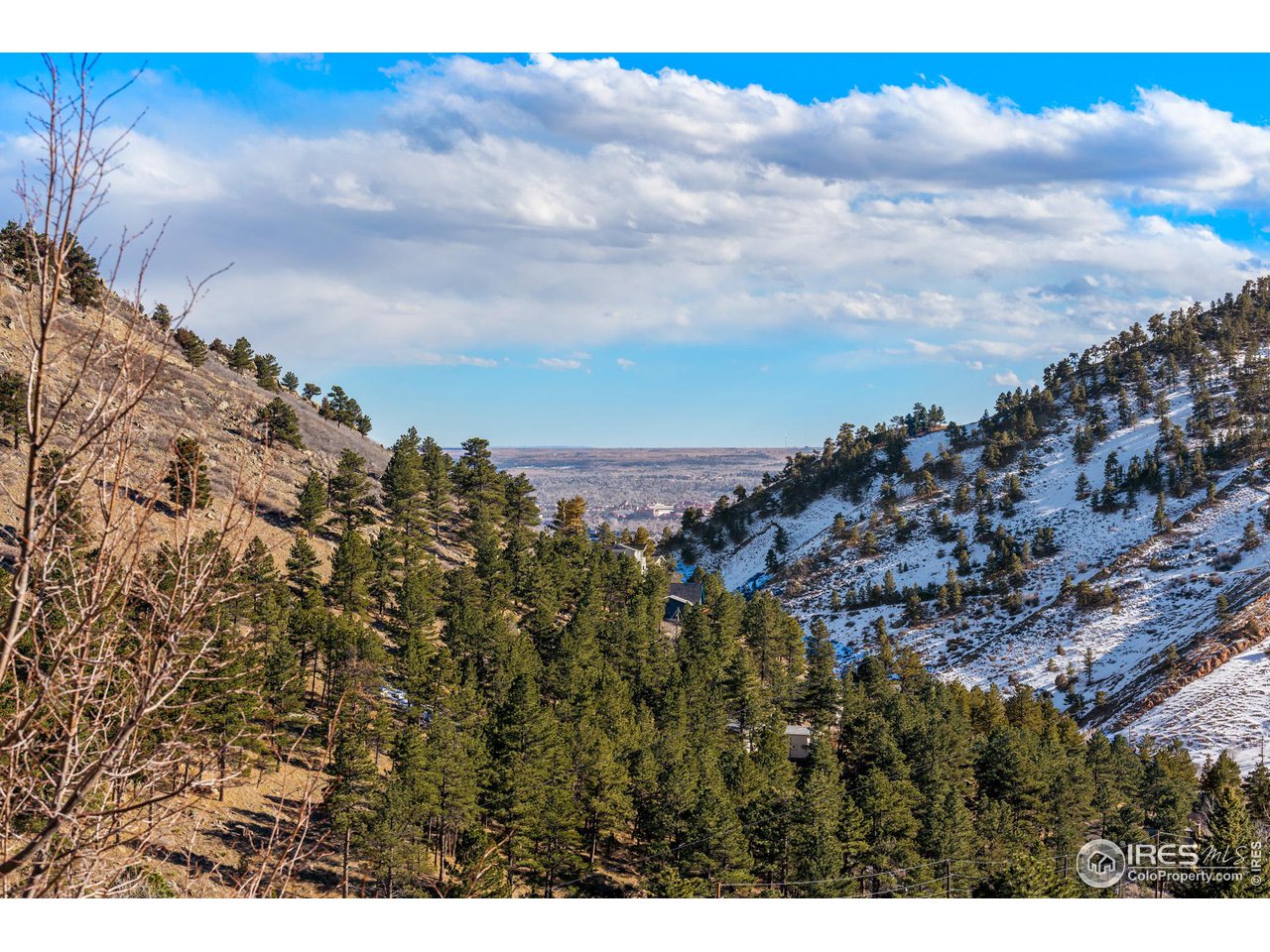 5339 Olde Stage Road Boulder, CO 80302 - Photo 34 of 40 University of Colorado Stadium in the distance. One of the many mountain vista views on display throughout the home.
