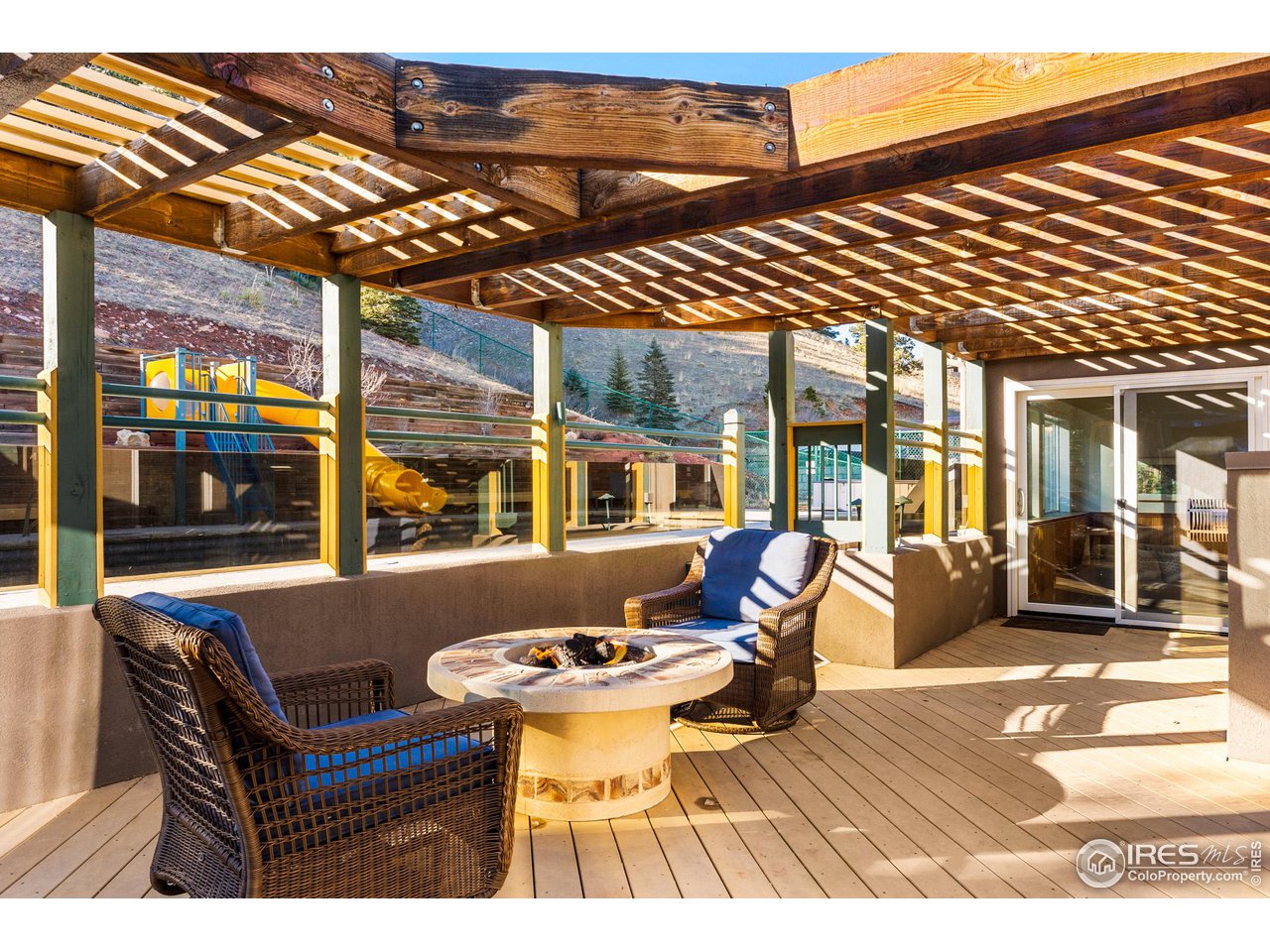 5339 Olde Stage Road Boulder, CO 80302 - Photo 37 of 40 Outdoor living at it's best... Adjacent to your 40 foot in-ground pool, shaded portico with gas fireplace.