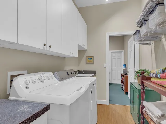a utility room with dryer and washer