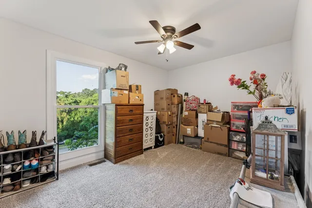 a view of a livingroom with furniture