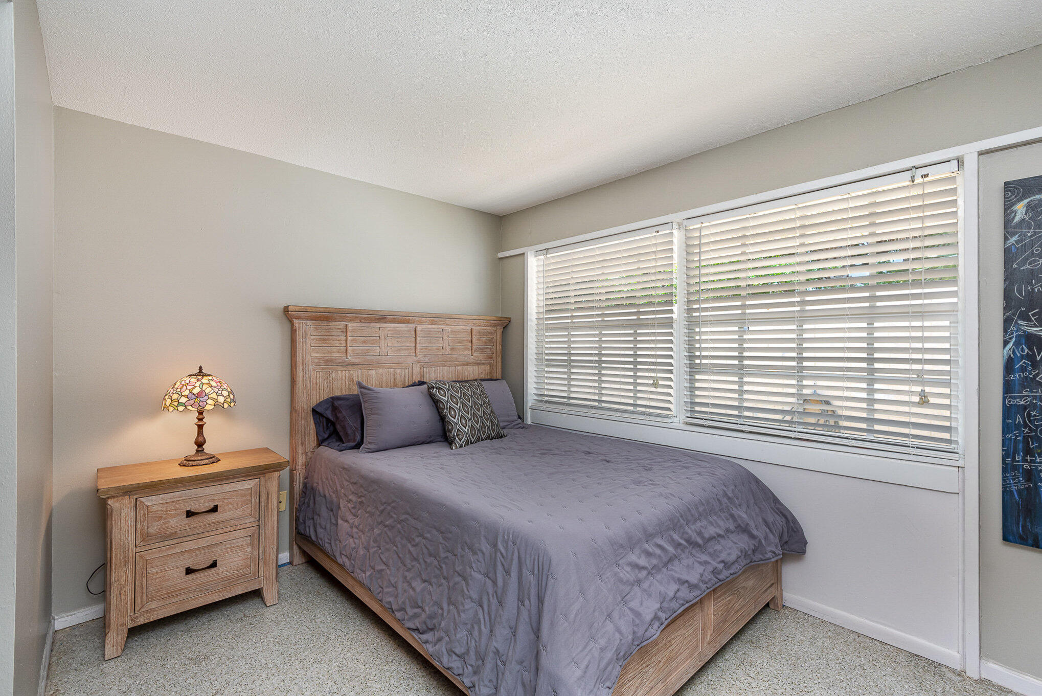 941 Levitt Parkway Rockledge, FL 32955 - Photo 16 of 33 a bedroom with a bed and a window