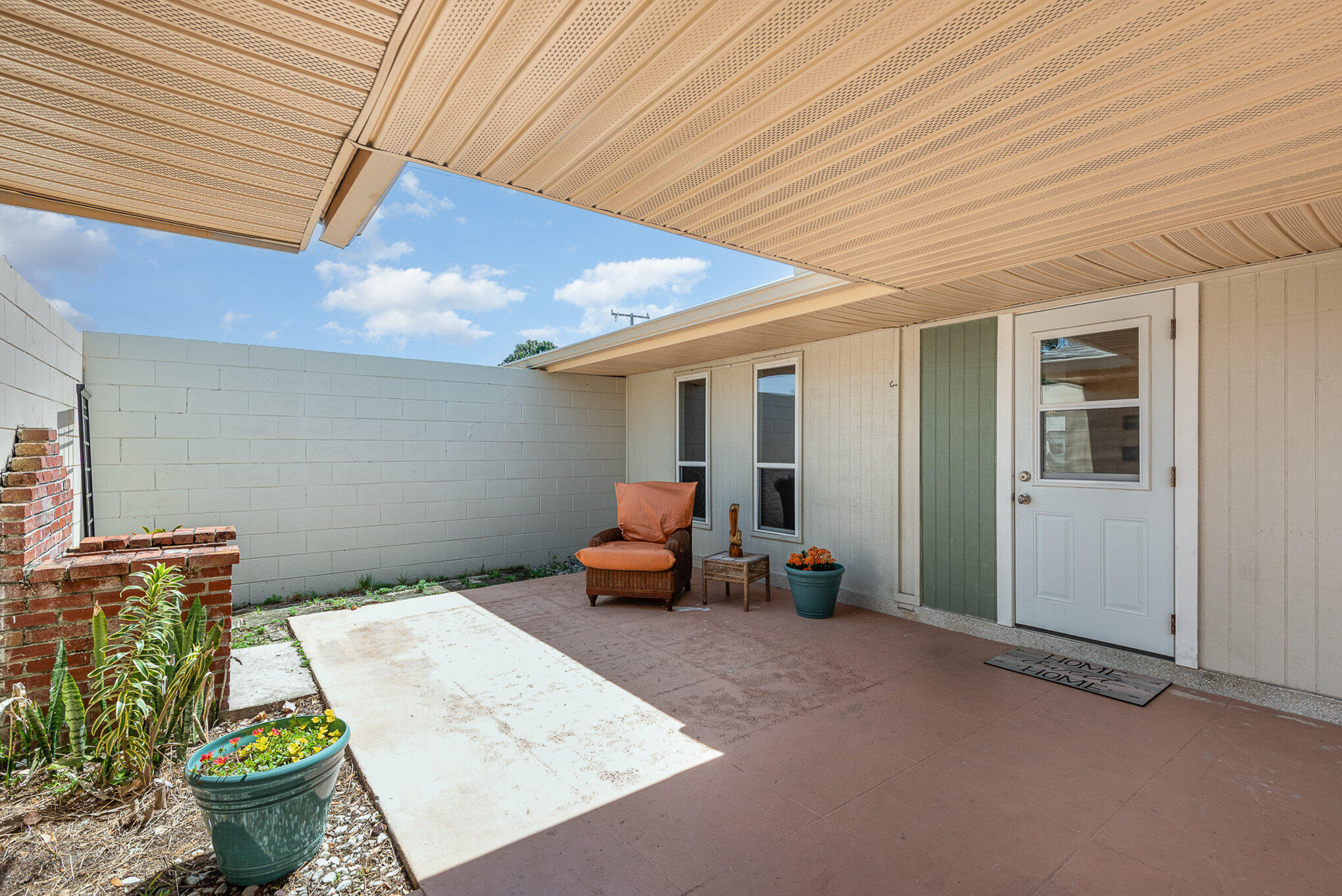 941 Levitt Parkway Rockledge, FL 32955 - Photo 20 of 33 a backyard of a house with seating space