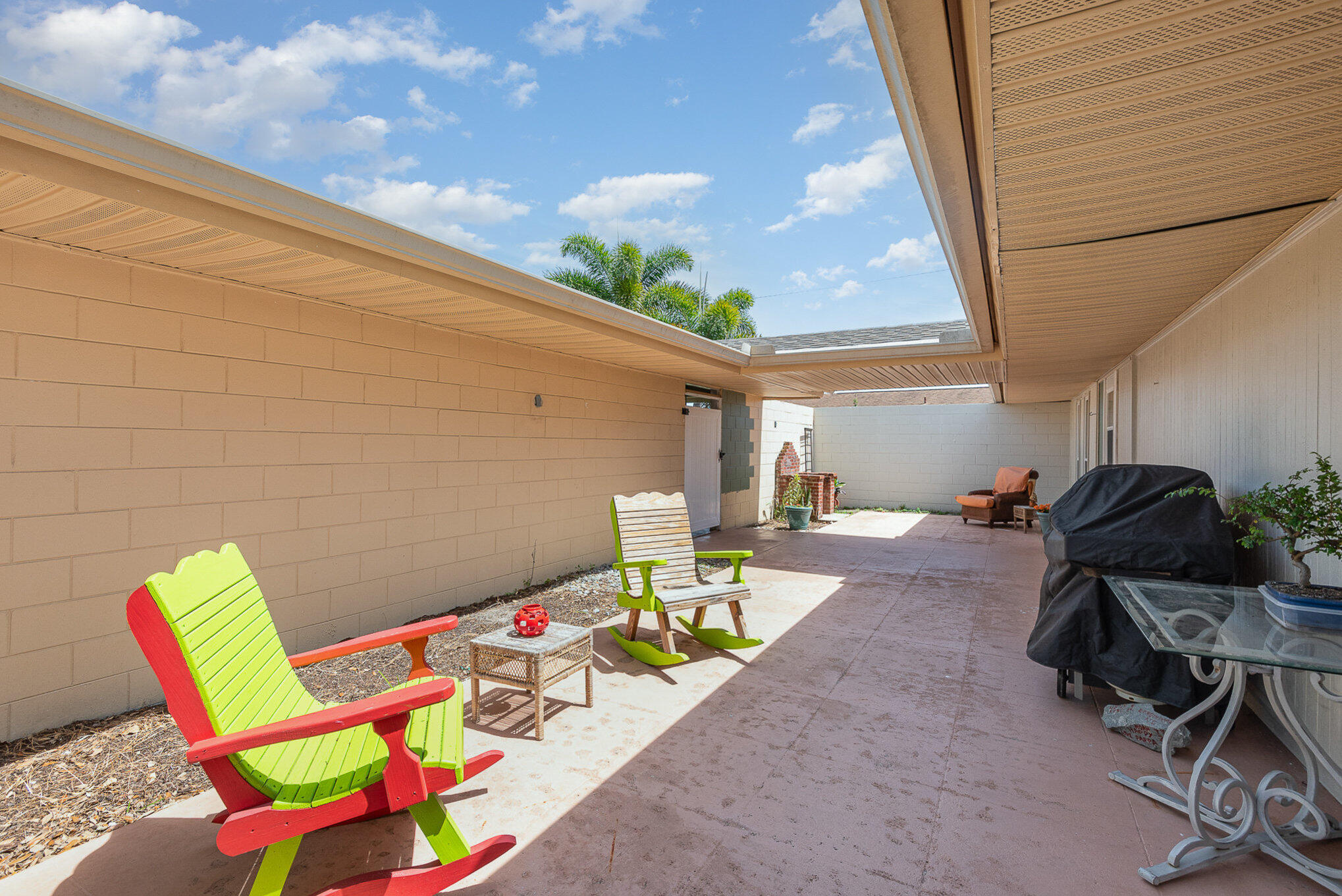 941 Levitt Parkway Rockledge, FL 32955 - Photo 21 of 33 a backyard with a table and chairs