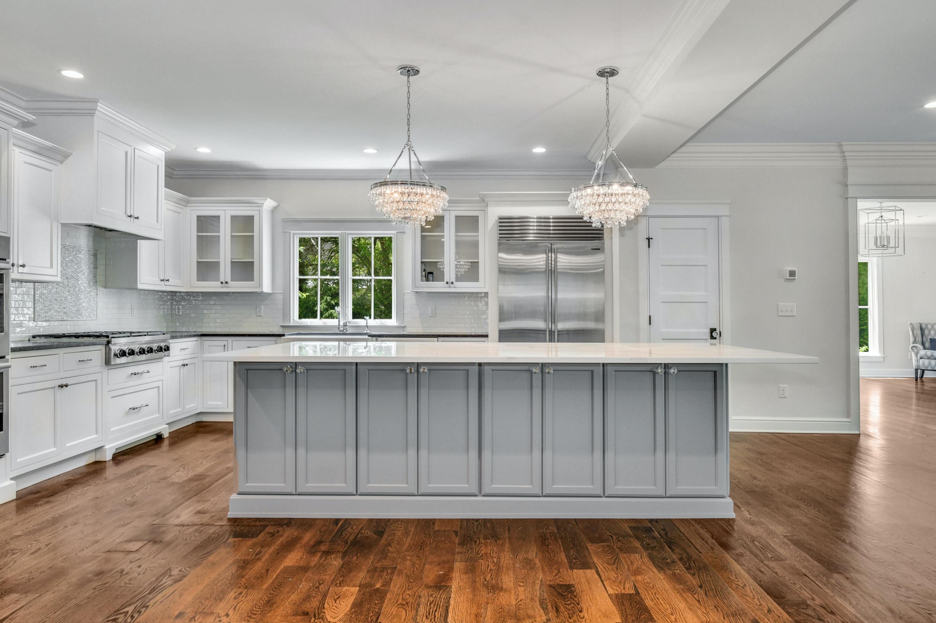 2271 Boston Post Road Darien, CT 06820 - Photo 11 of 40 a view of kitchen with window and wooden cabinets