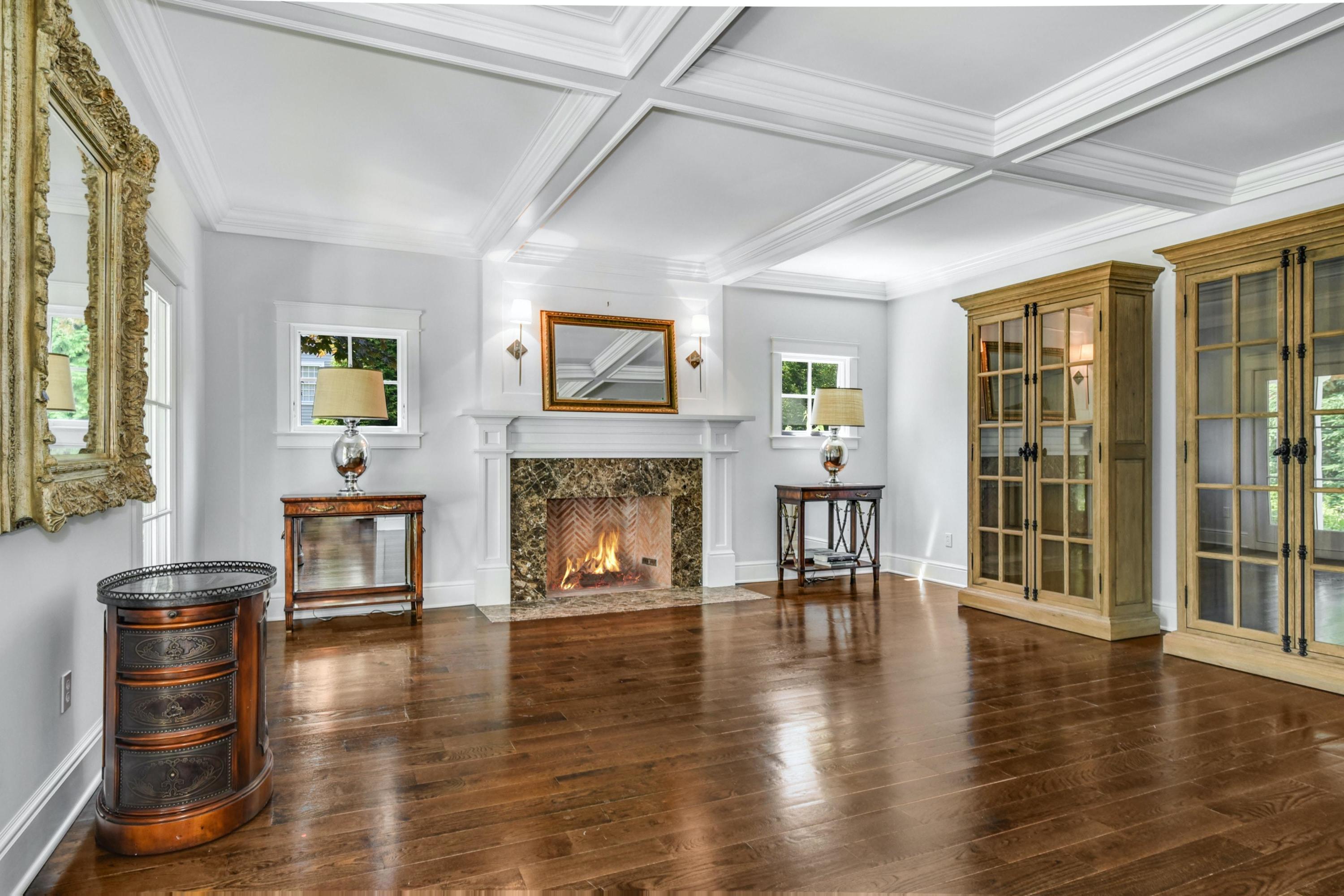 2271 Boston Post Road Darien, CT 06820 - Photo 16 of 40 a living room with furniture and a fireplace