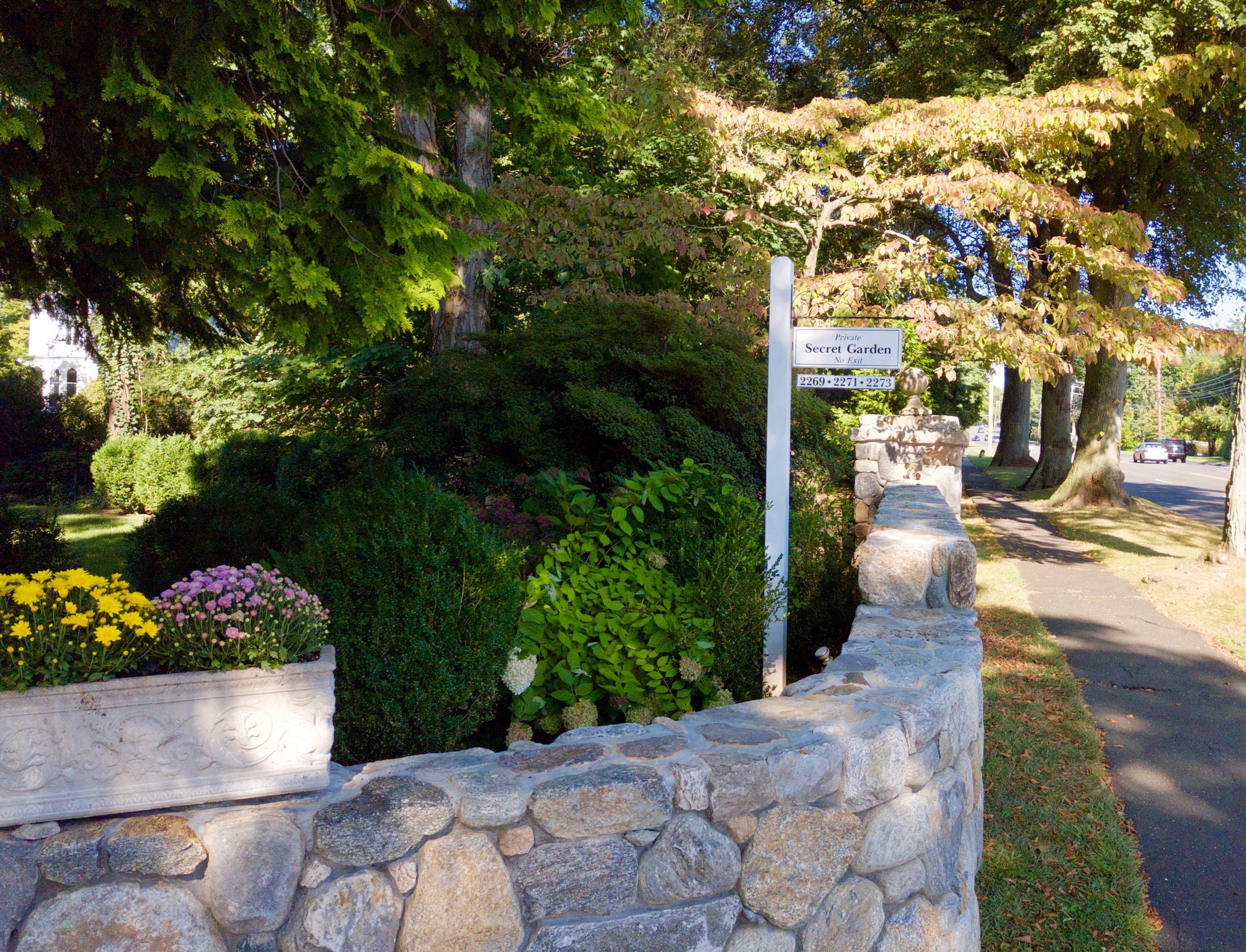 2271 Boston Post Road Darien, CT 06820 - Photo 33 of 40 a view of a back yard of the patio and green space
