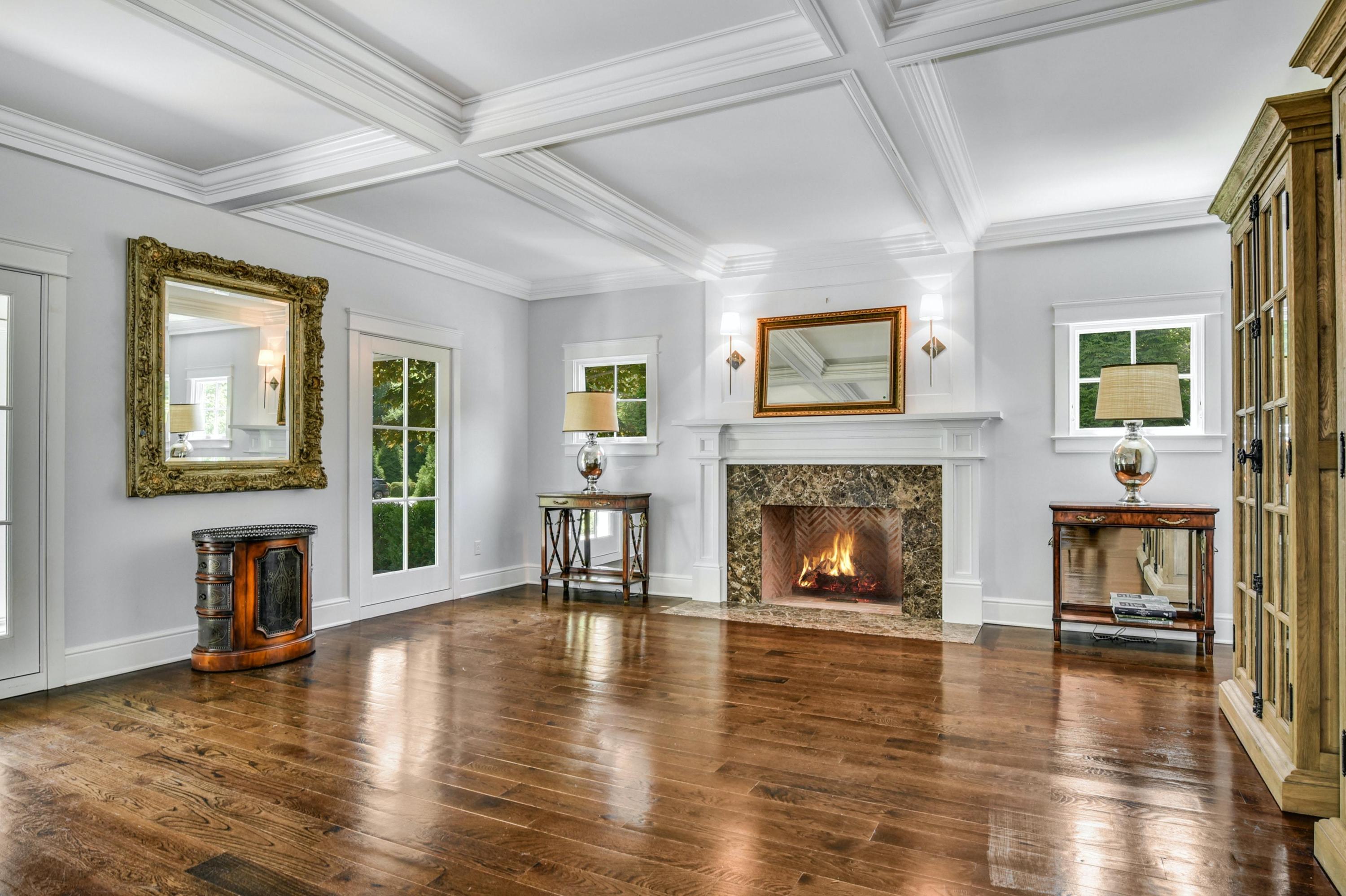2271 Boston Post Road Darien, CT 06820 - Photo 5 of 40 a living room with furniture and a fireplace