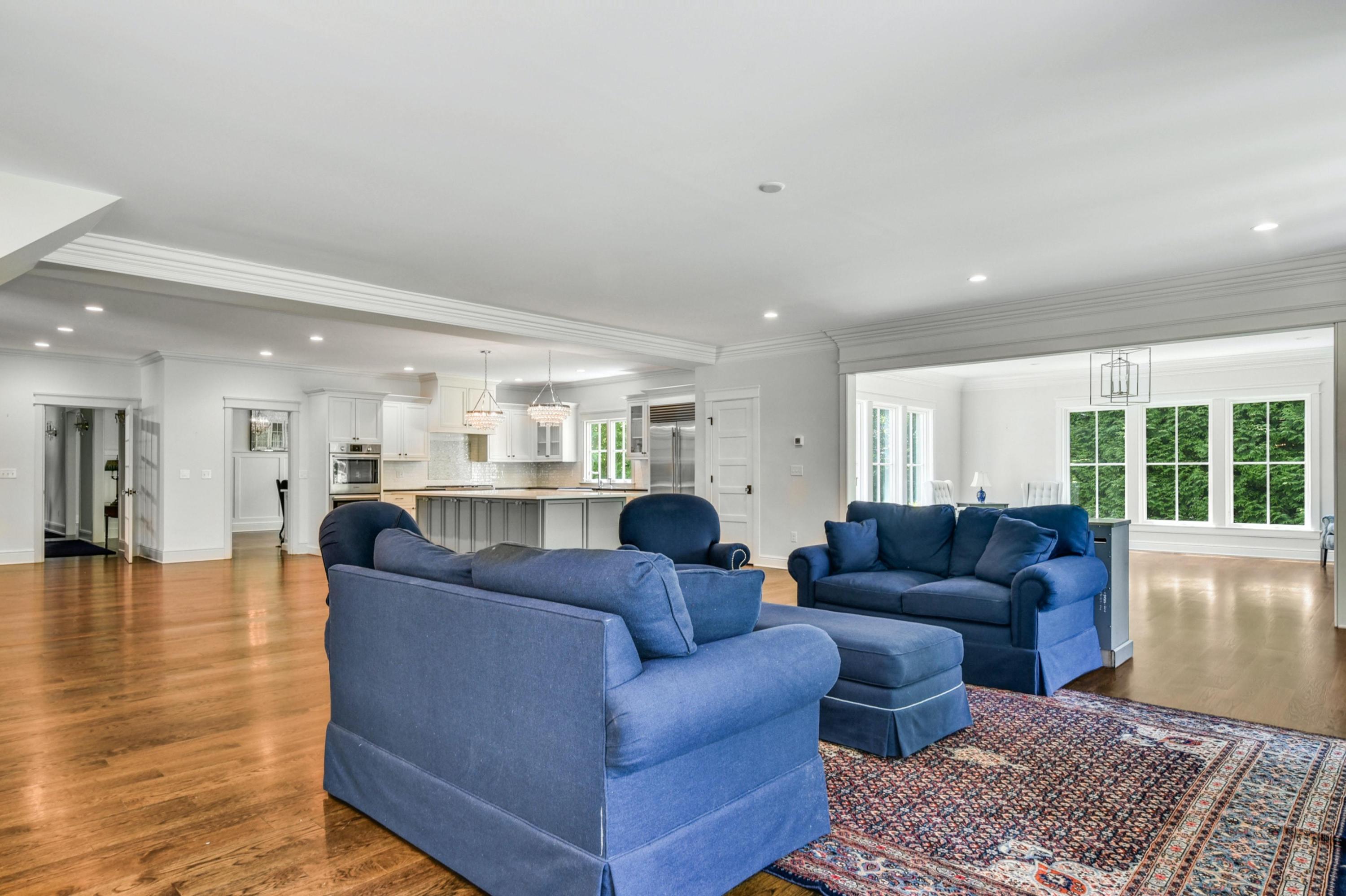 2271 Boston Post Road Darien, CT 06820 - Photo 6 of 40 a living room with furniture and a large window