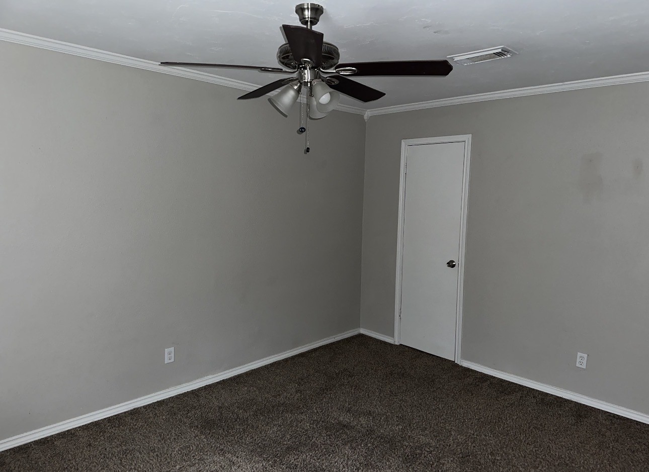 2106 Woodway Drive Woodbranch, TX 77357 - Photo 12 of 17 a view of a room with a ceiling fan and a ceiling fan