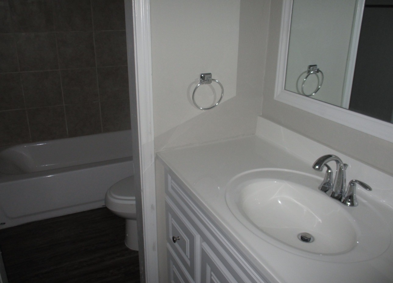 2106 Woodway Drive Woodbranch, TX 77357 - Photo 16 of 17 a bathroom with a sink a toilet and shower