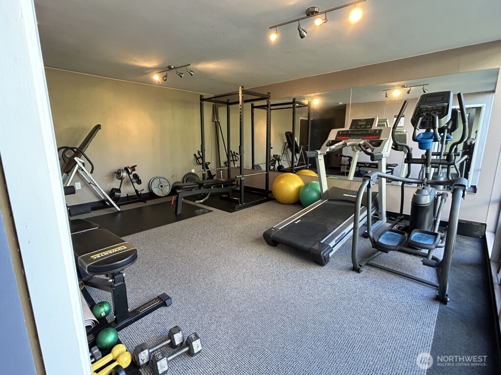 4561 Lake Washington Boulevard Northeast, Unit 303 Kirkland, WA 98033 - Photo 13 of 16 a view of a room with gym equipment