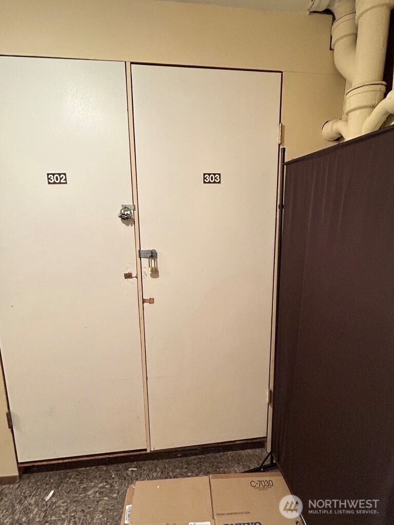 4561 Lake Washington Boulevard Northeast, Unit 303 Kirkland, WA 98033 - Photo 15 of 16 a bathroom with a shower