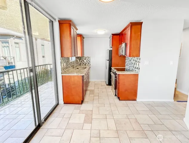 a view of a storage with an empty room and wooden floor