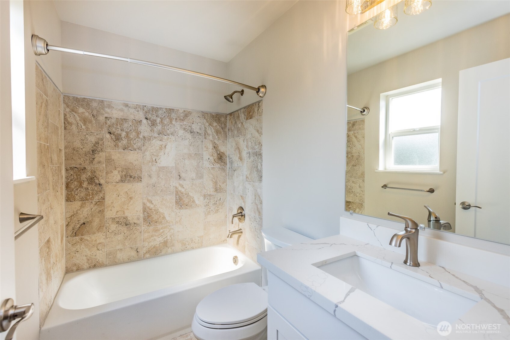 105 May Creek Road Gold Bar, WA 98251 - Photo 28 of 38 a bathroom with a granite countertop bathtub shower sink vanity mirror and toilet