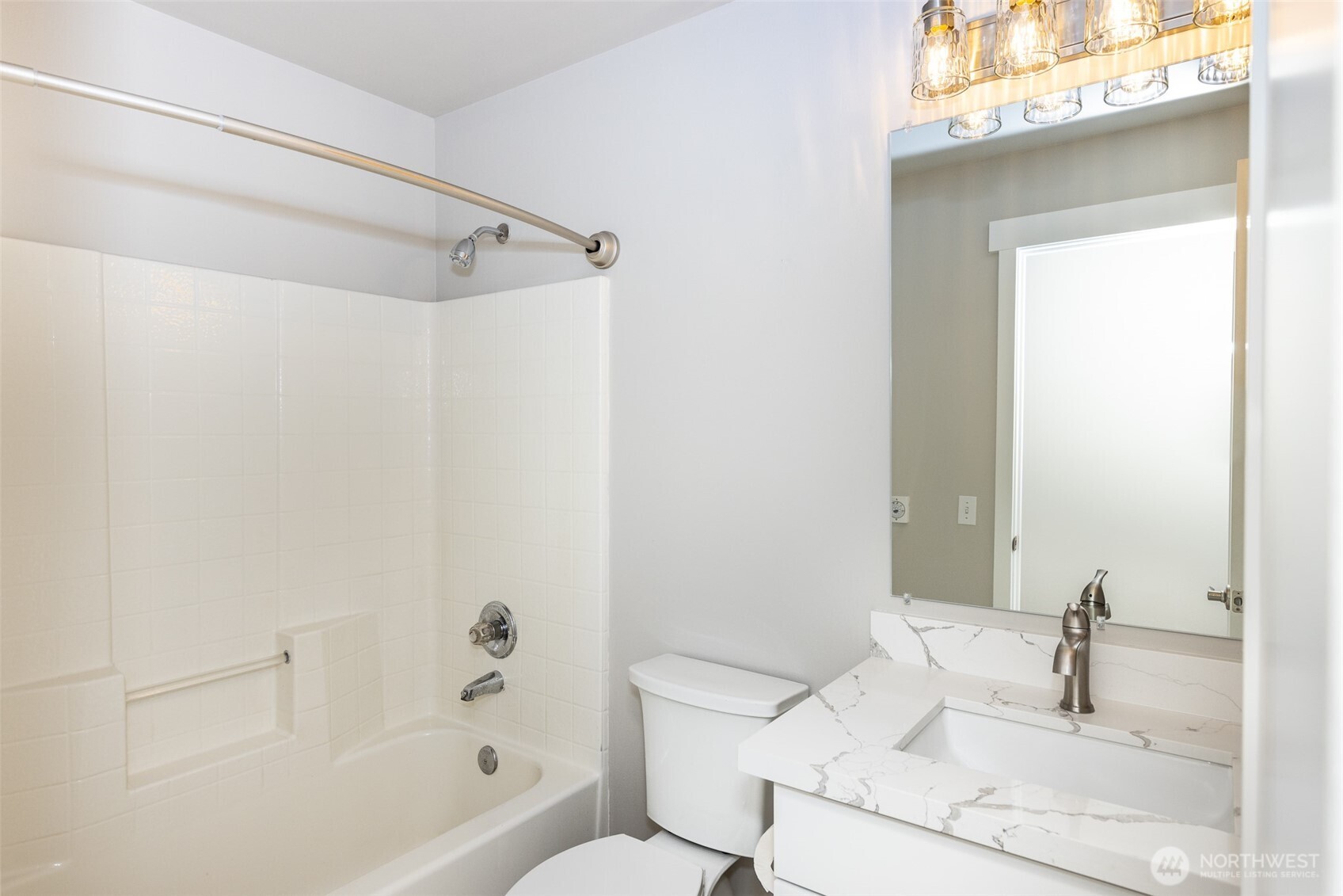 105 May Creek Road Gold Bar, WA 98251 - Photo 30 of 38 a bathroom with a sink and a mirror