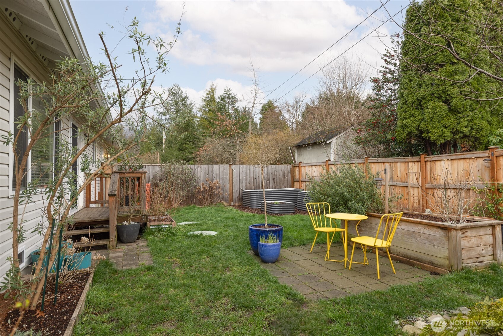 105 May Creek Road Gold Bar, WA 98251 - Photo 33 of 38 a view of backyard with seating space and trees