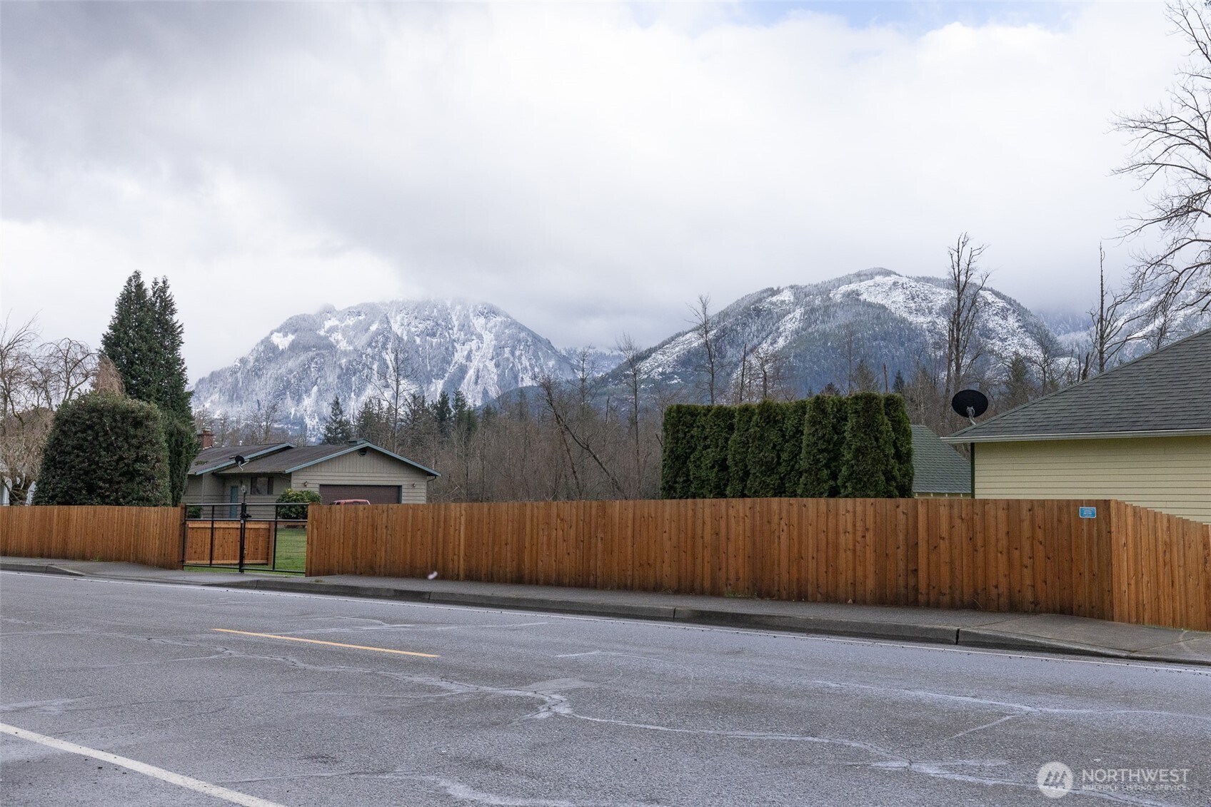 105 May Creek Road Gold Bar, WA 98251 - Photo 36 of 38 a view of house and mountains in the background