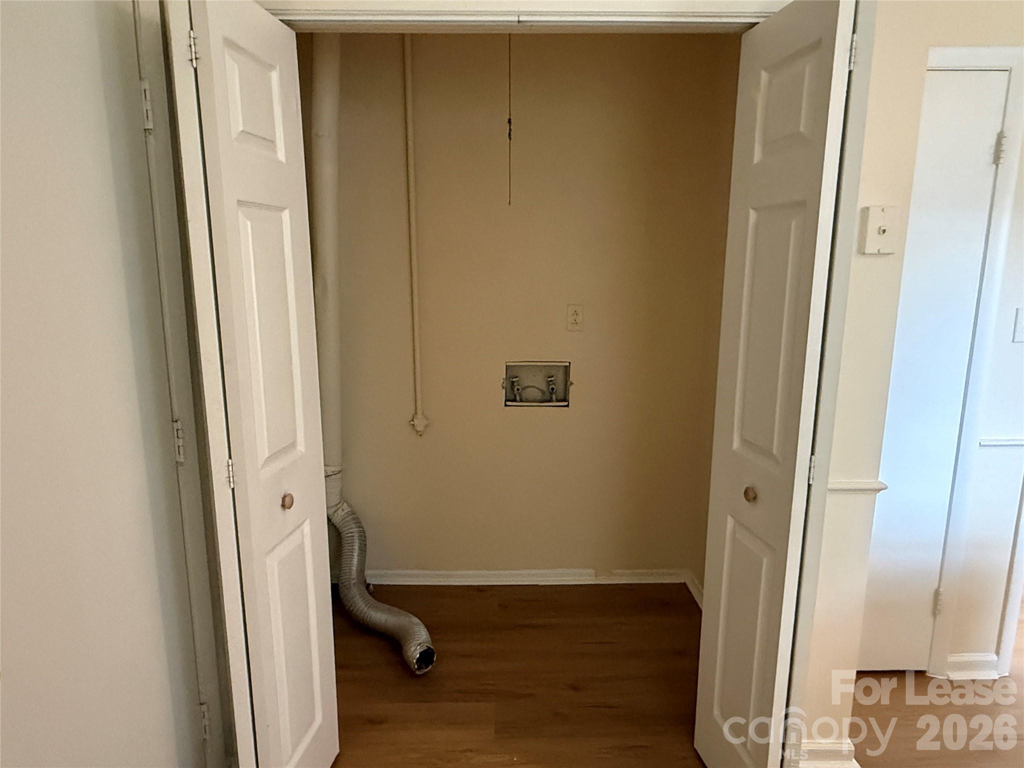 6341 Round Hill Road Charlotte, NC 28211 - Photo 13 of 16 an entryway with wooden floor