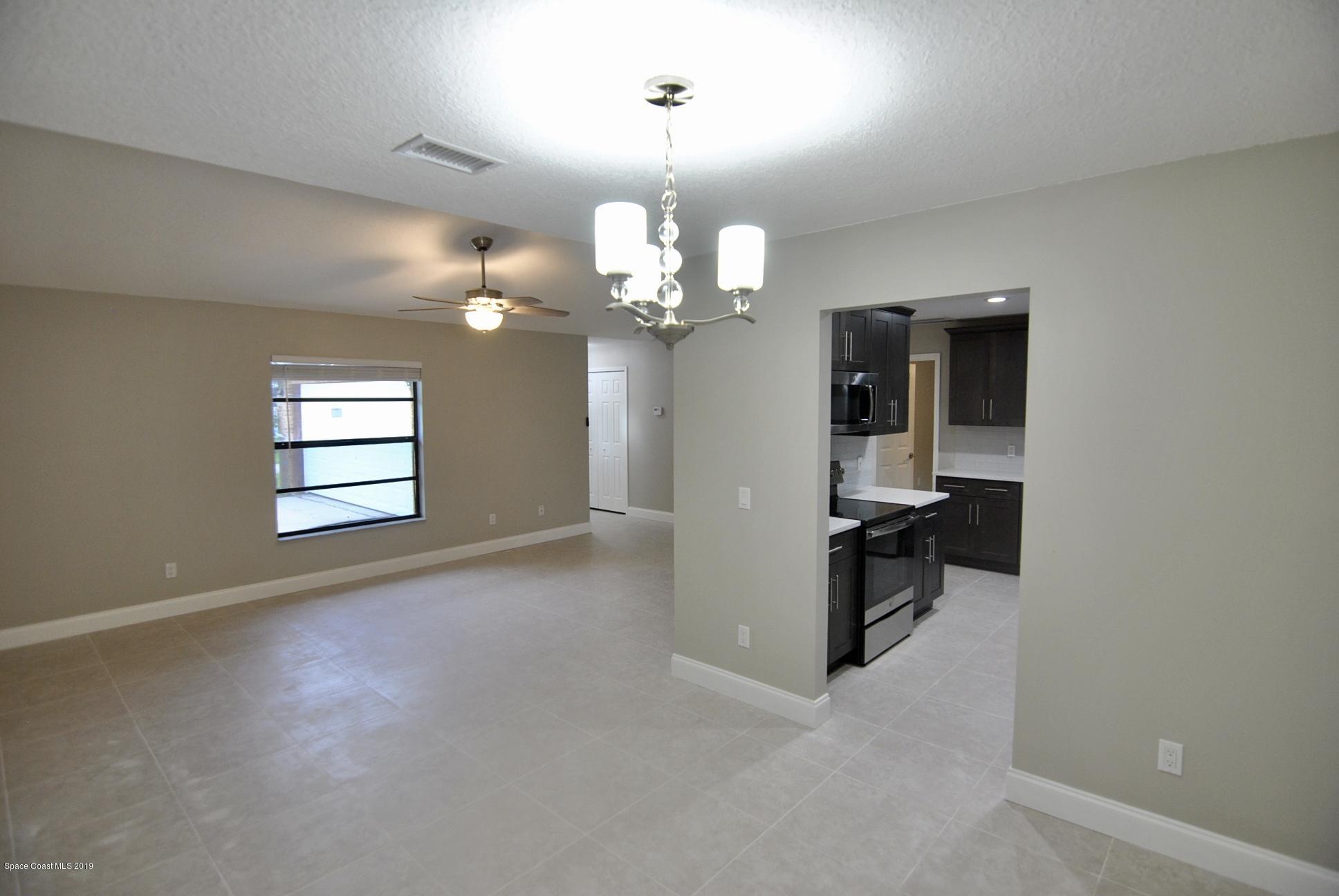 472 Trier Road Northwest Palm Bay, FL 32907 - Photo 3 of 20 fullsizeoutput_747