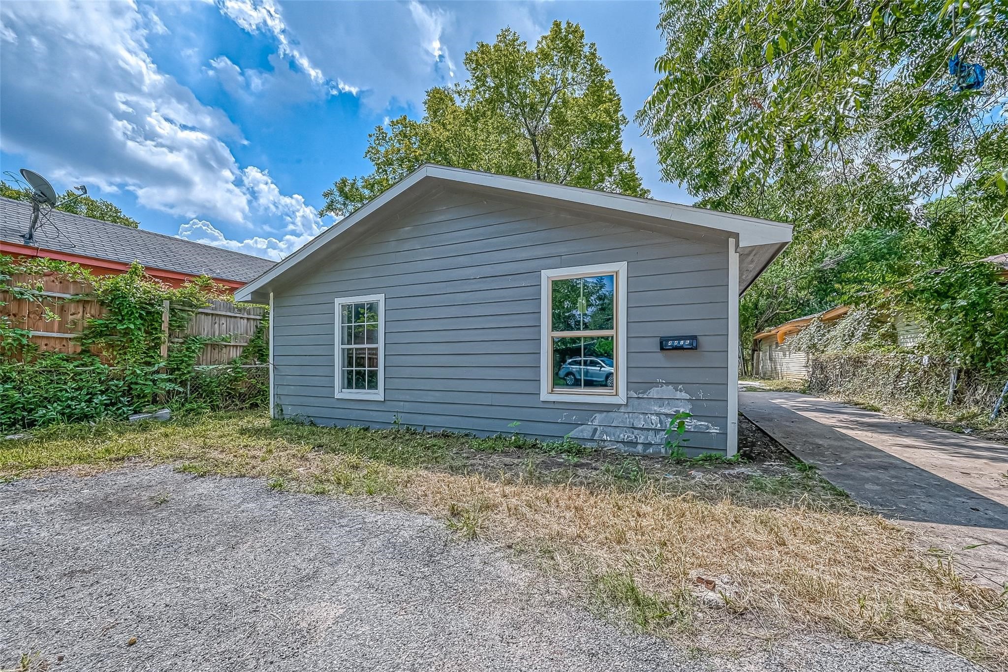 4416 Quitman Street, Unit A Houston, TX 77026 - Photo 2 of 8 a view of a house with a yard