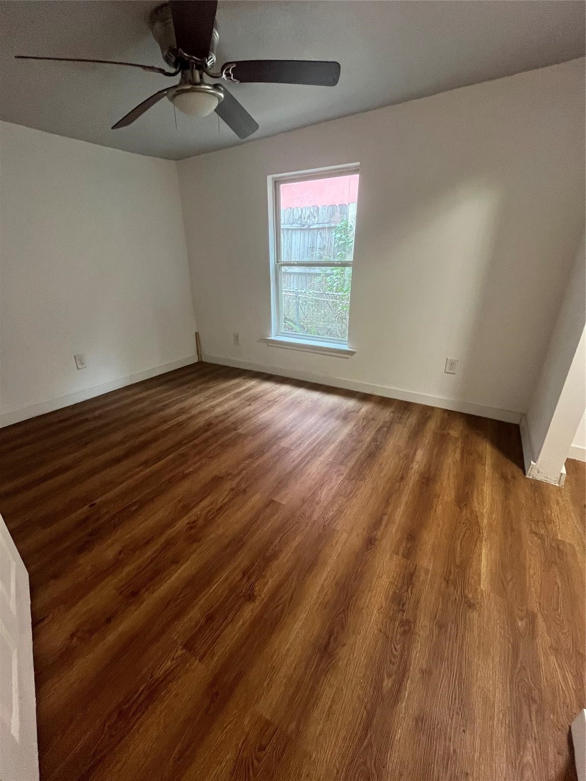 4416 Quitman Street, Unit A Houston, TX 77026 - Photo 4 of 8 wooden floor in an empty room