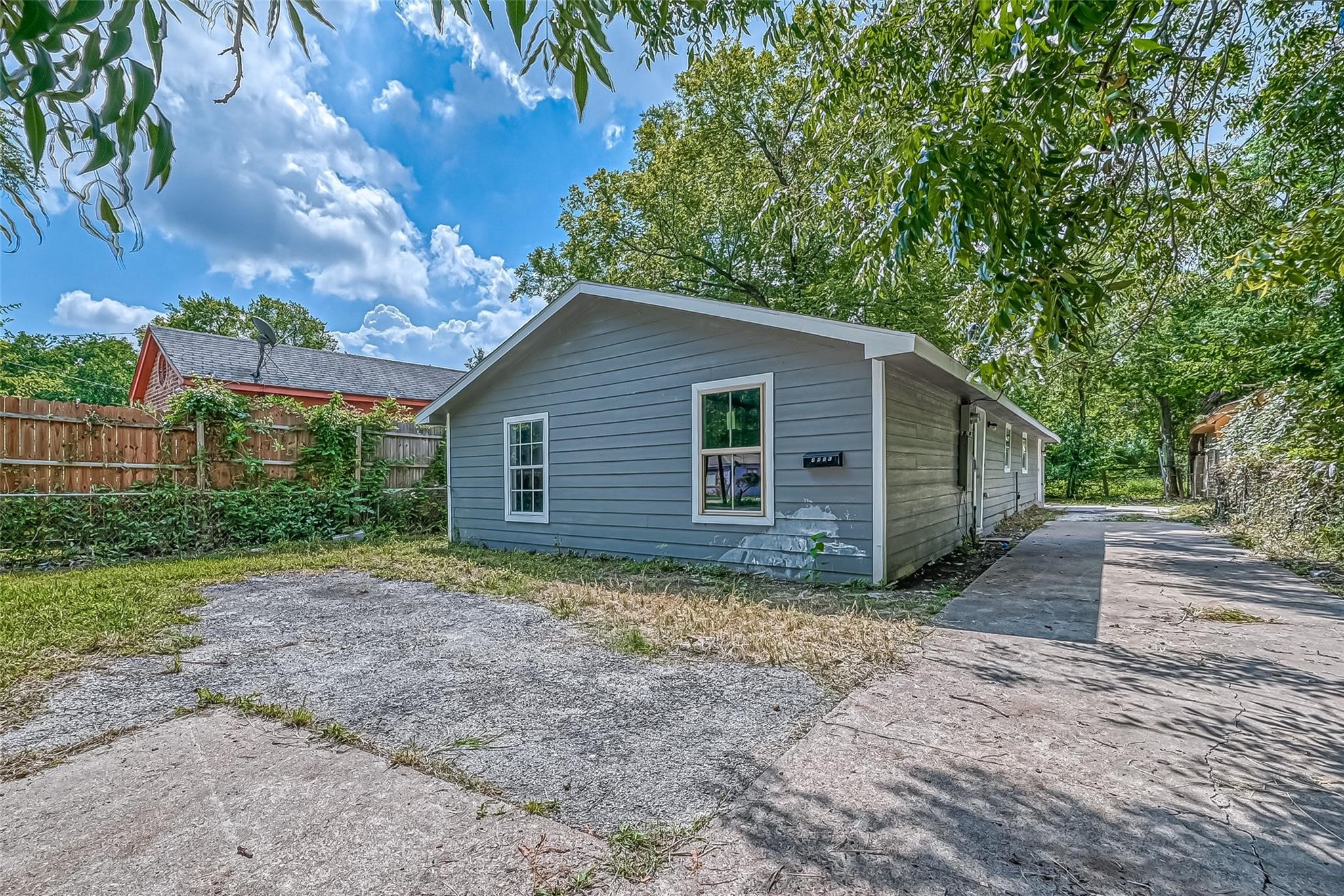 4416 Quitman Street, Unit A Houston, TX 77026 - Photo 6 of 8 a view of a house with a yard