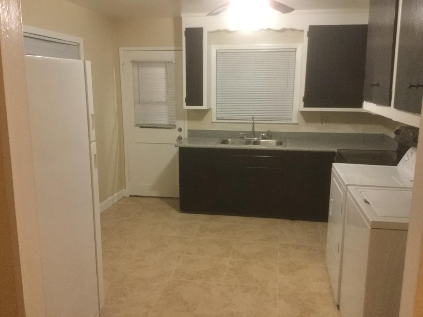 Peralta Street Hayward, CA 94541 - Photo 11 of 17 a bathroom with a sink and a mirror