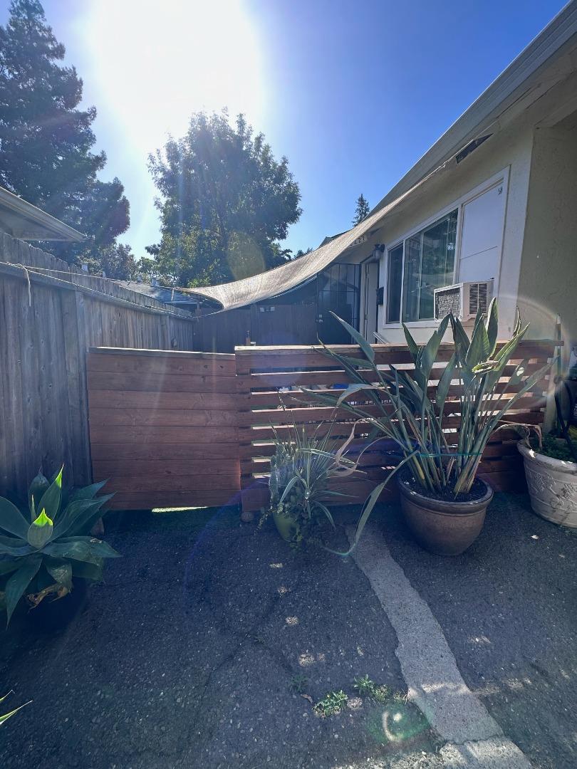 Peralta Street Hayward, CA 94541 - Photo 15 of 17 a wooden bench sitting in front of a building