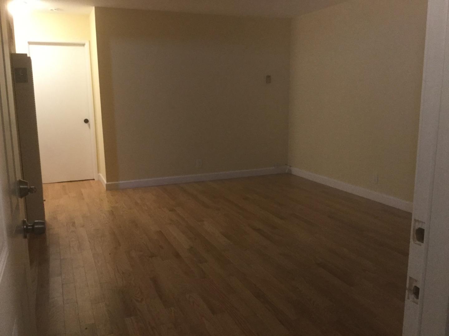 Peralta Street Hayward, CA 94541 - Photo 17 of 17 an empty room with wooden floor