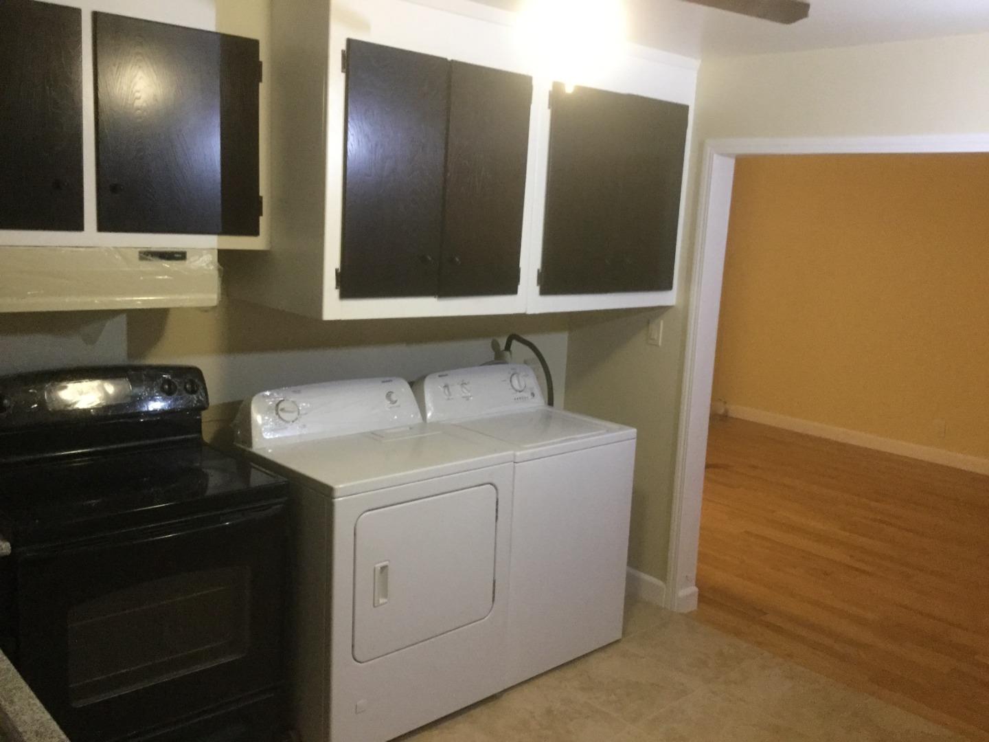 Peralta Street Hayward, CA 94541 - Photo 3 of 17 a bathroom with a sink and a mirror