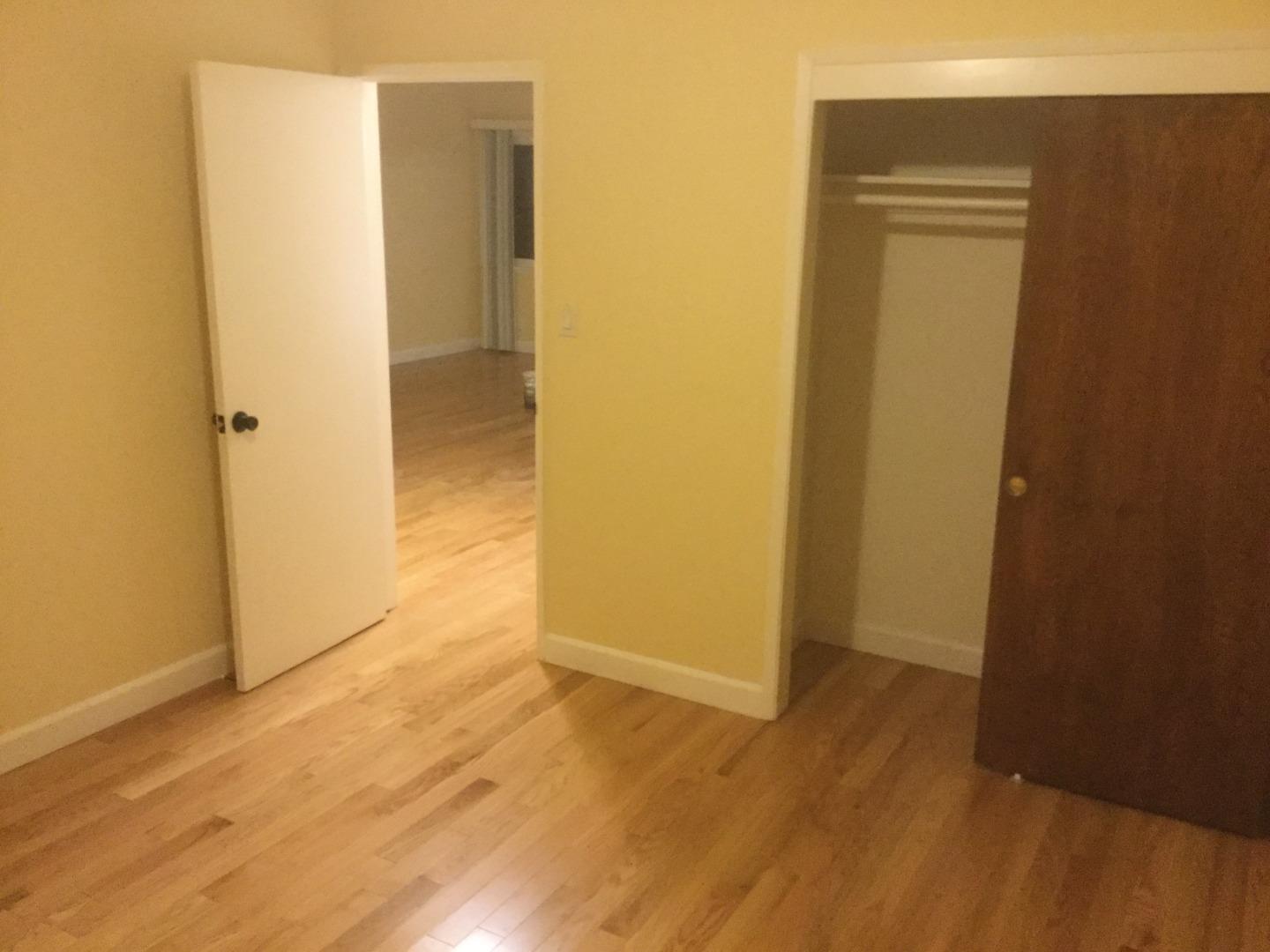 Peralta Street Hayward, CA 94541 - Photo 8 of 17 a view of a hallway with wooden floor