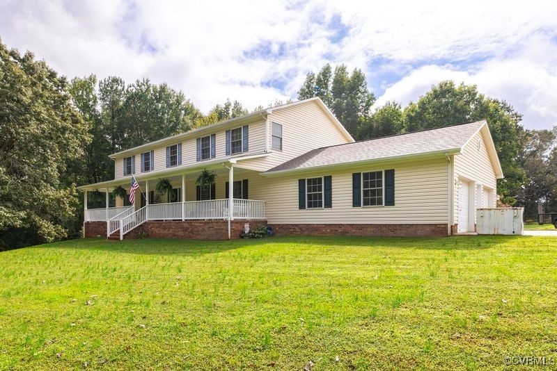 6084 Lockett Road Rice, VA 23966 - Photo 1 of 1 a view of a house with a swimming pool and a yard