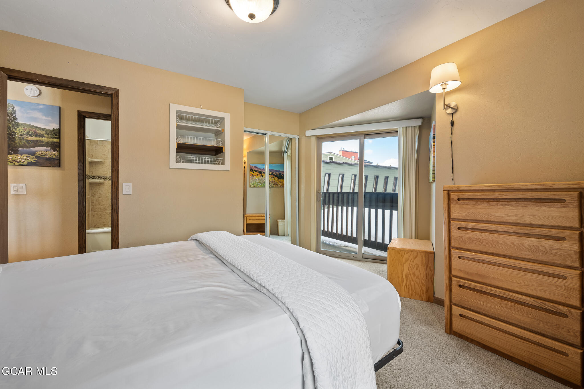 490 Kings Crossing Road, Unit 611 Winter Park, CO 80482 - Photo 29 of 39 a bedroom with a bed and a window