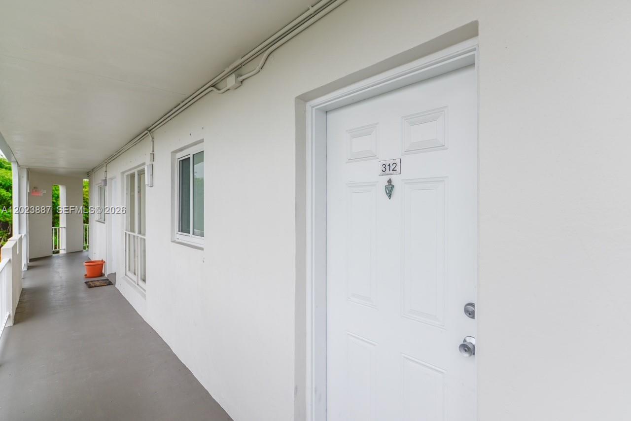 7737 Southwest 88th Street, Unit C312 Miami, FL 33156 - Photo 28 of 32 a view of an entryway
