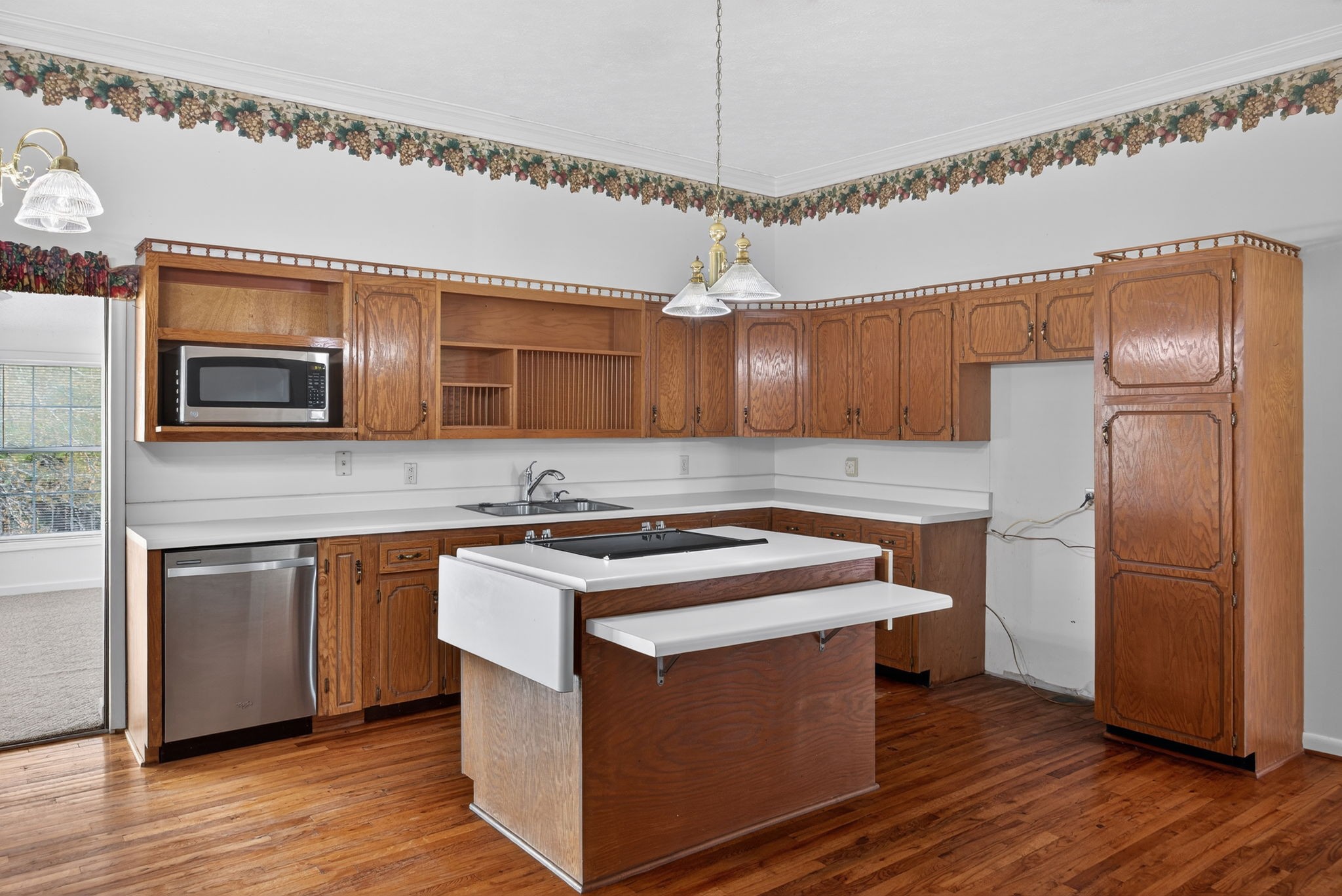 165 Almyra Road Sparta, TN 38583 - Photo 15 of 49 a kitchen with stainless steel appliances granite countertop a stove a refrigerator and a microwave