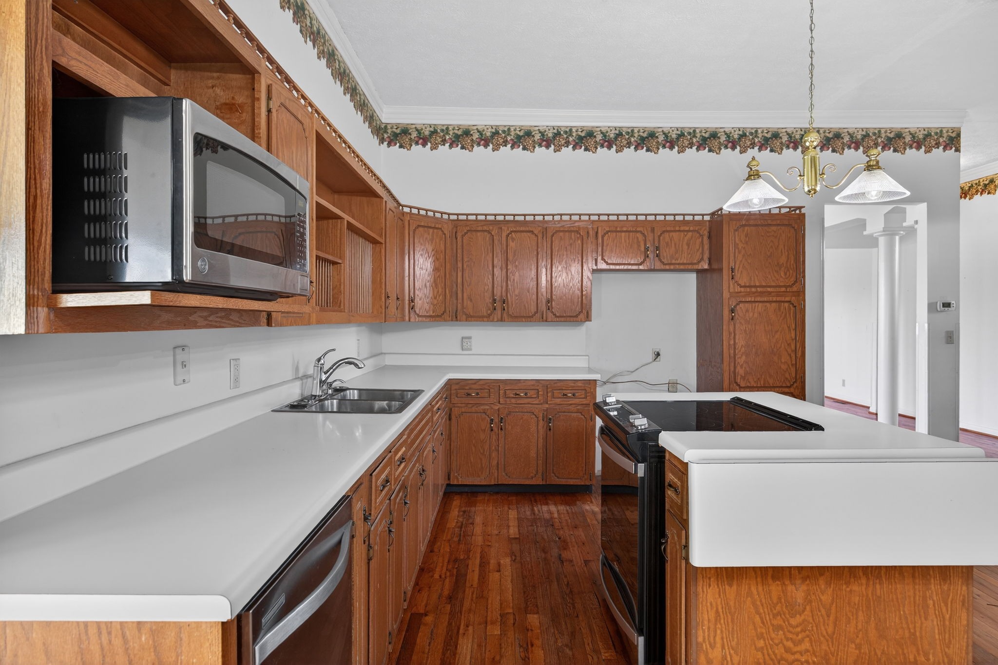 165 Almyra Road Sparta, TN 38583 - Photo 18 of 49 a kitchen with a sink a stove and cabinets