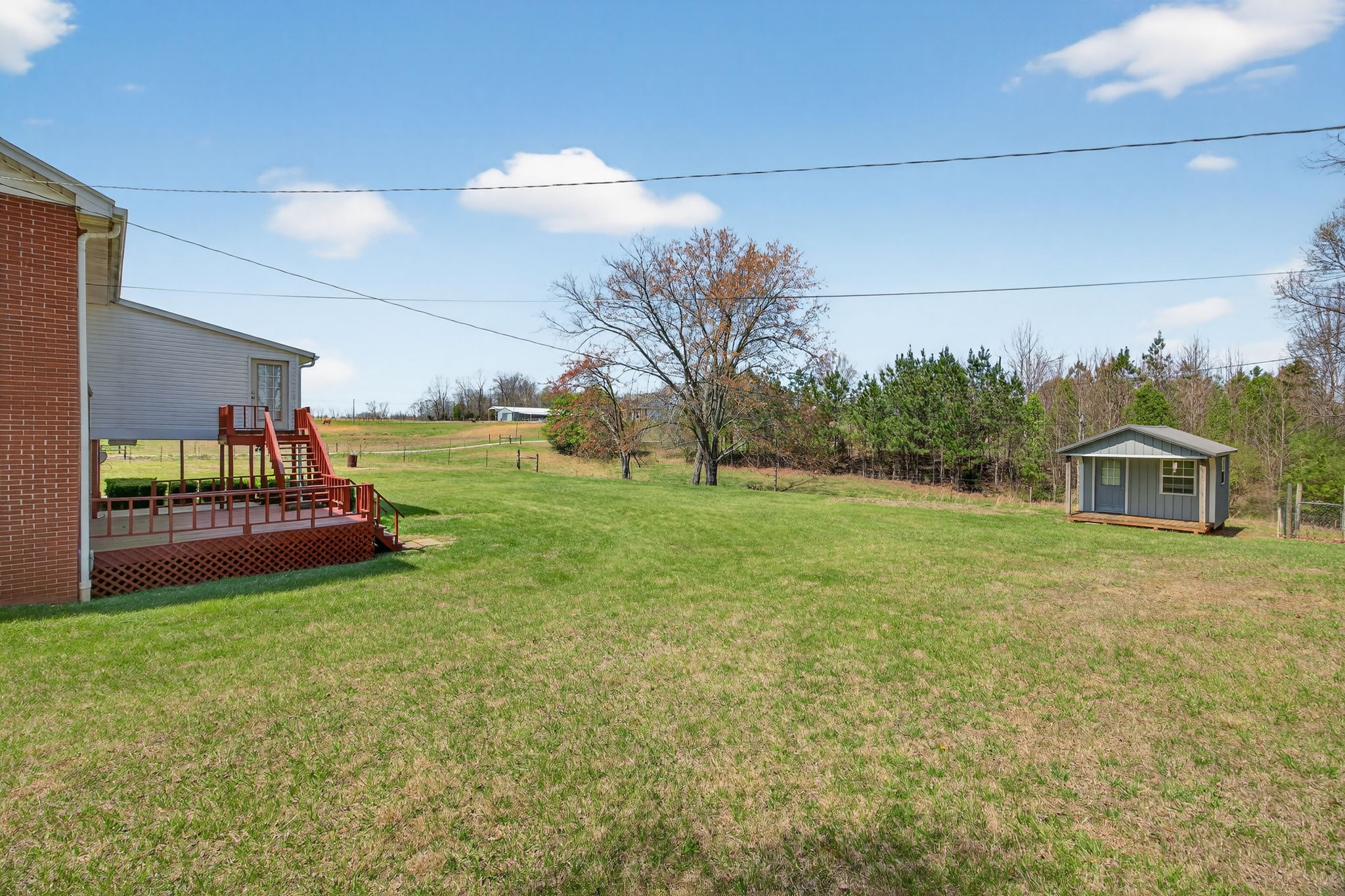 165 Almyra Road Sparta, TN 38583 - Photo 39 of 49 a view of a house with backyard and garden
