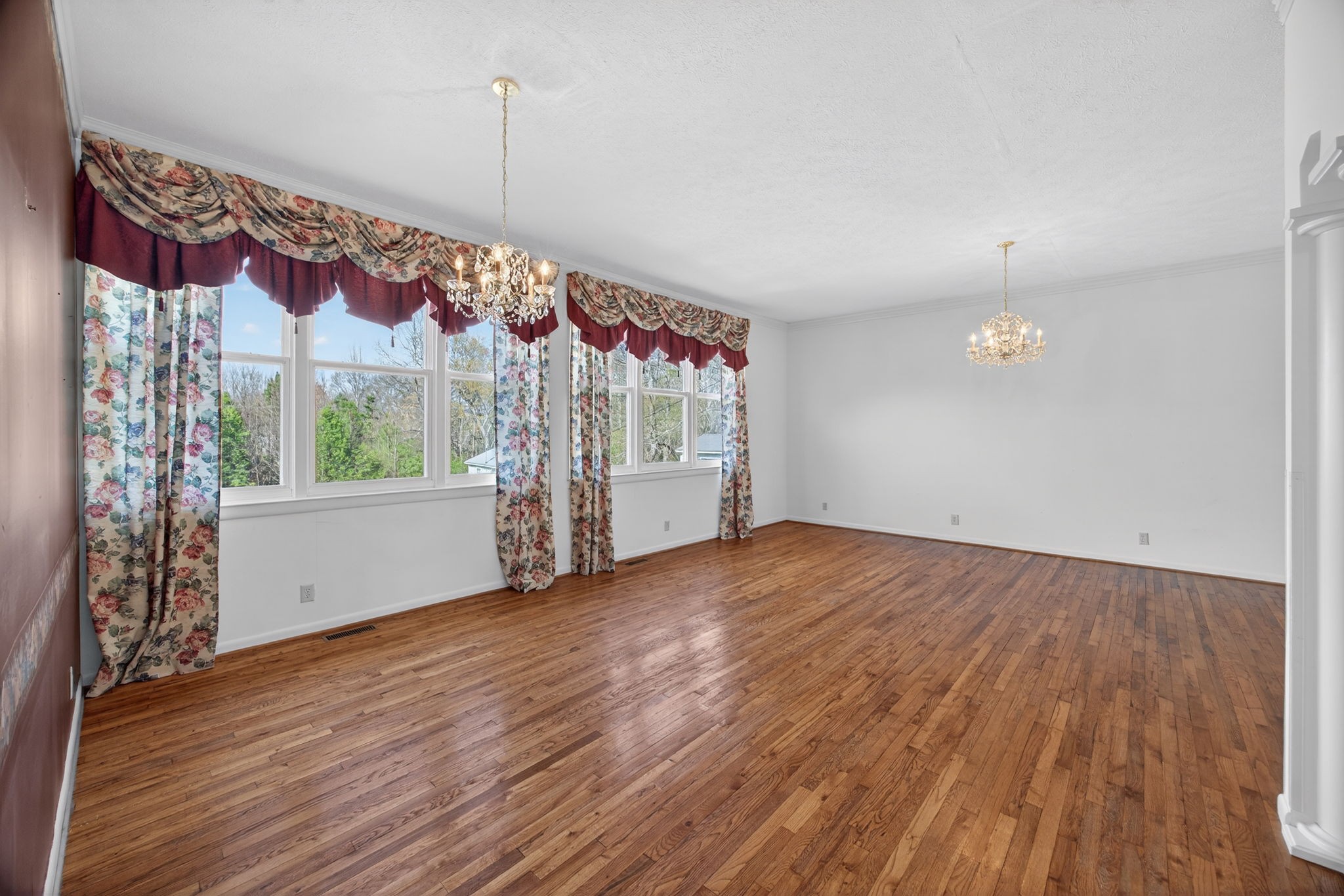 165 Almyra Road Sparta, TN 38583 - Photo 10 of 49 an empty room with wooden floor and windows