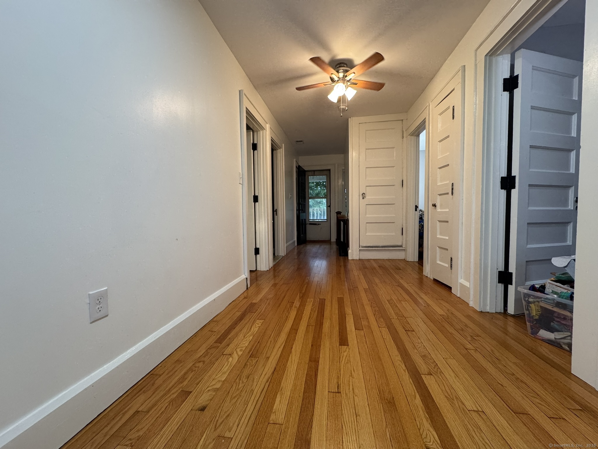 127 Lambert Avenue Meriden, CT 06451 - Photo 16 of 37 a view of a room with wooden floor and staircase