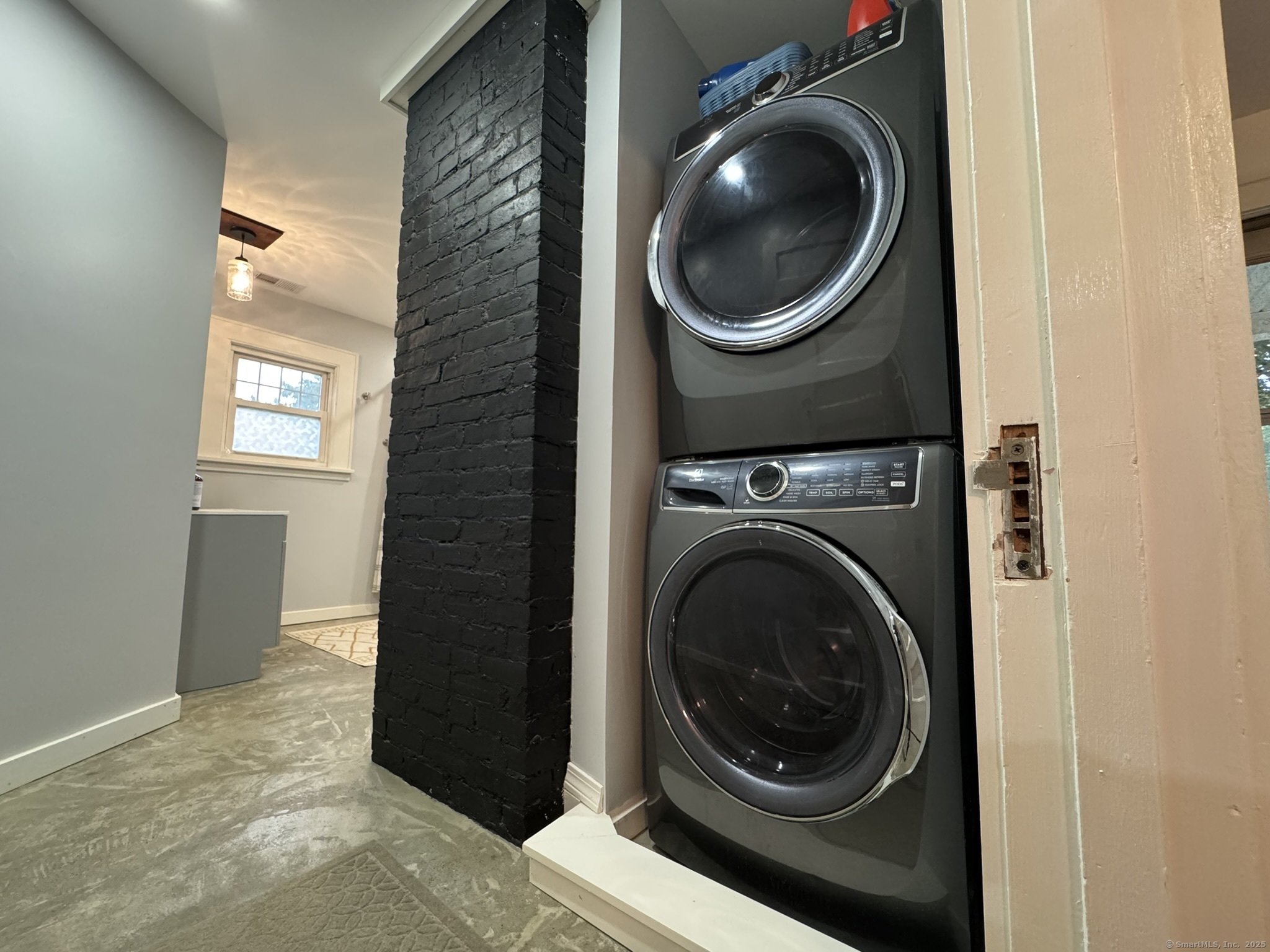 127 Lambert Avenue Meriden, CT 06451 - Photo 25 of 37 a view of a hallway with washer and dryer