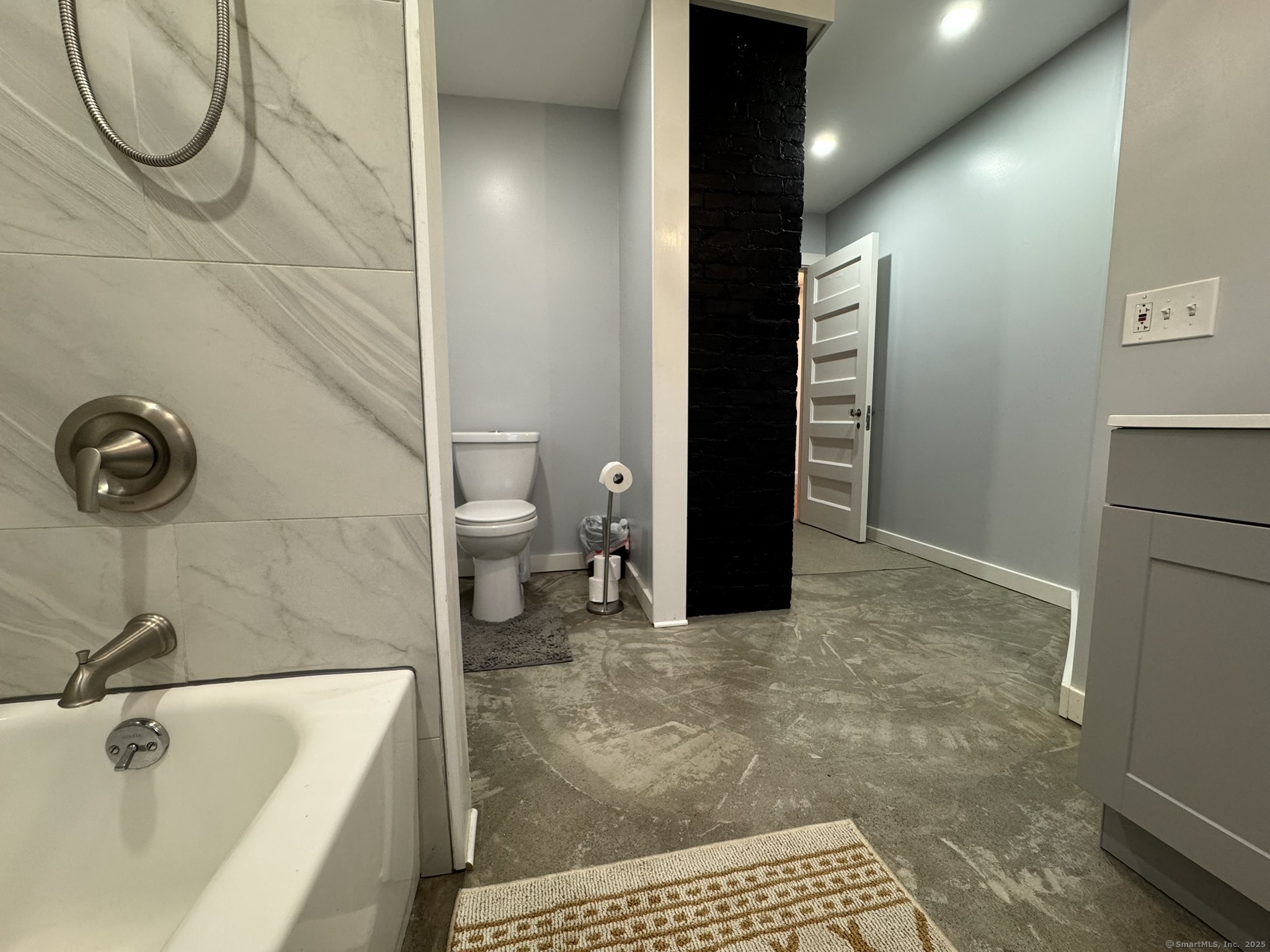 127 Lambert Avenue Meriden, CT 06451 - Photo 28 of 37 a bathroom with a sink a toilet and shower