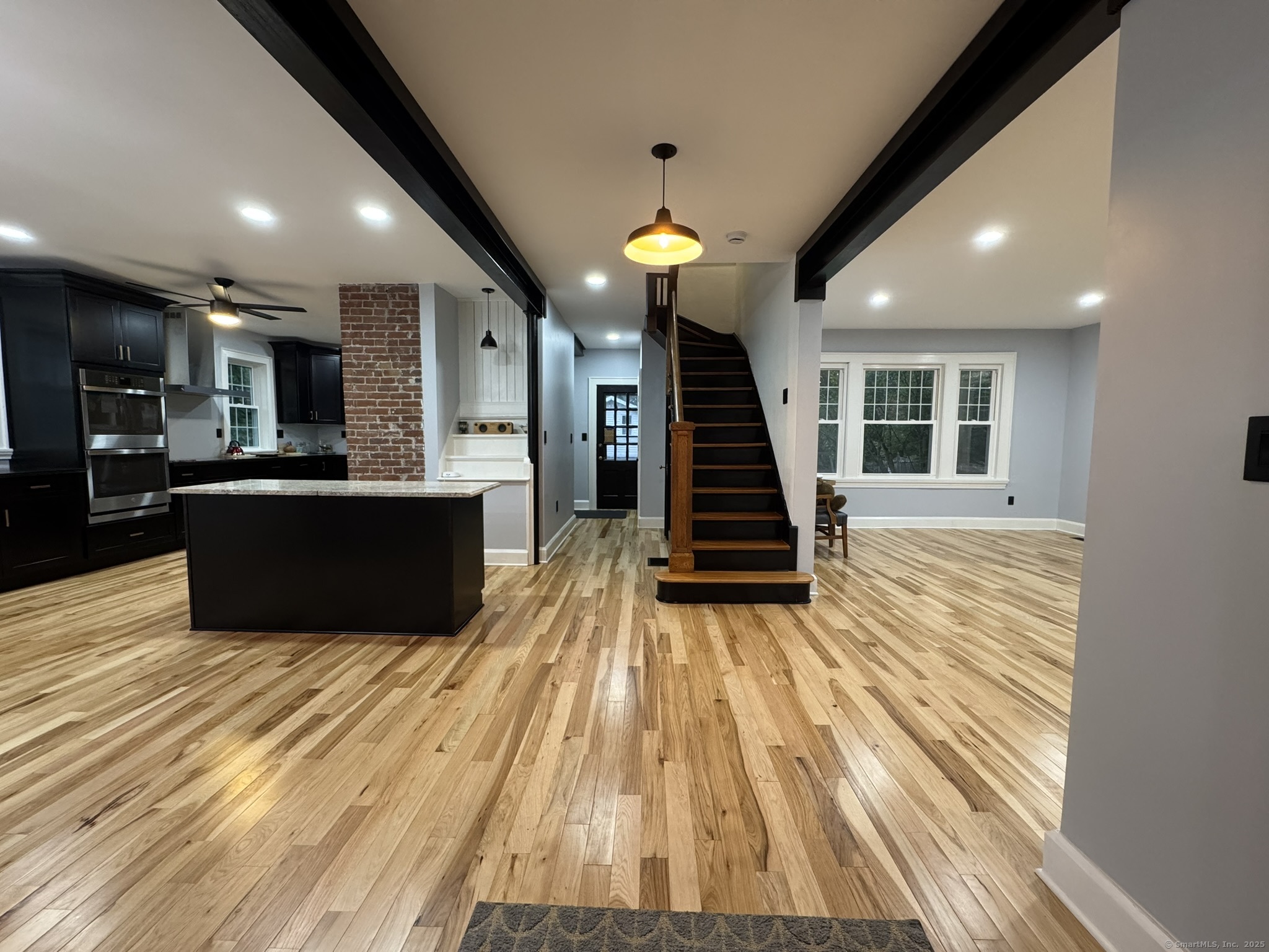 127 Lambert Avenue Meriden, CT 06451 - Photo 4 of 37 a view of kitchen with wooden floor and stainless steel appliances