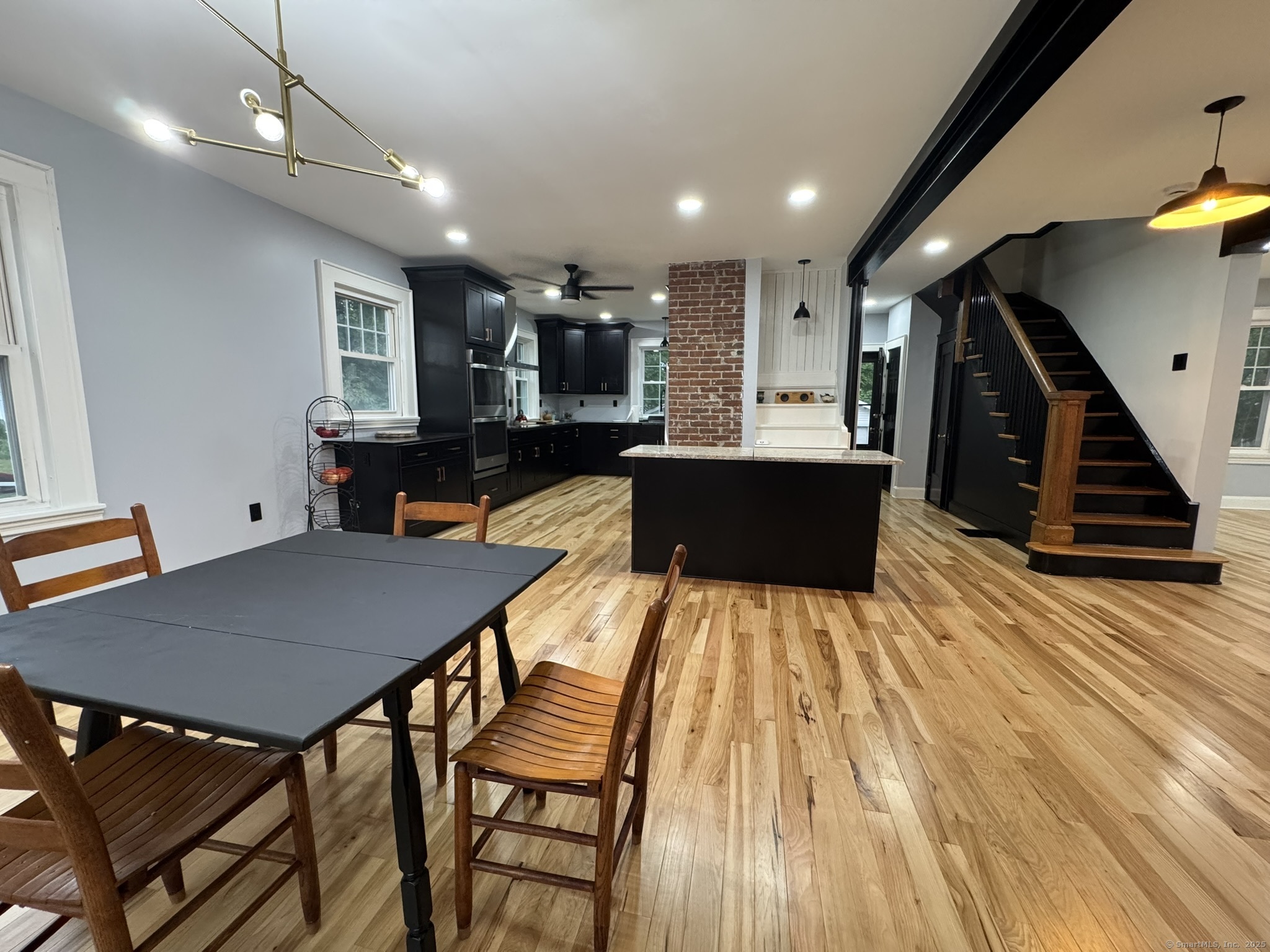 127 Lambert Avenue Meriden, CT 06451 - Photo 6 of 37 a living room with a table tennis pool table and chairs