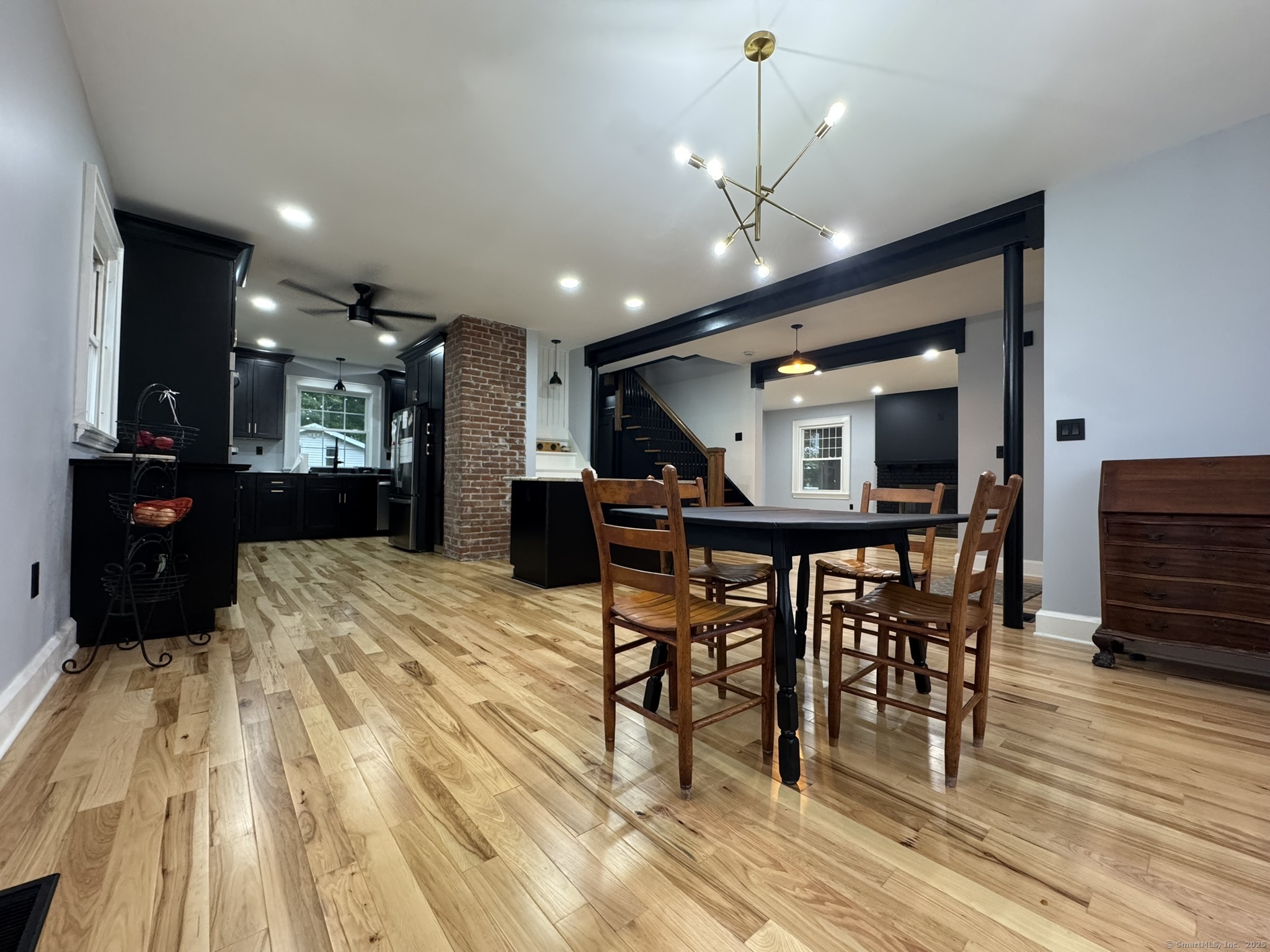 127 Lambert Avenue Meriden, CT 06451 - Photo 7 of 37 a view of a dining room with furniture and wooden floor